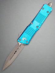 Microtech Combat Troodon 142-10APTQ Apocalyptic Double Edge Blade Turquoise Handle