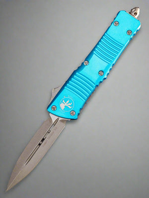 Microtech Combat Troodon 142-10APTQ Apocalyptic Double Edge Blade Turquoise Handle