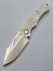Heretic Knives Pariah M/A Button Lock White Camo Carbon Handles w/ Stonewash MagnaCut