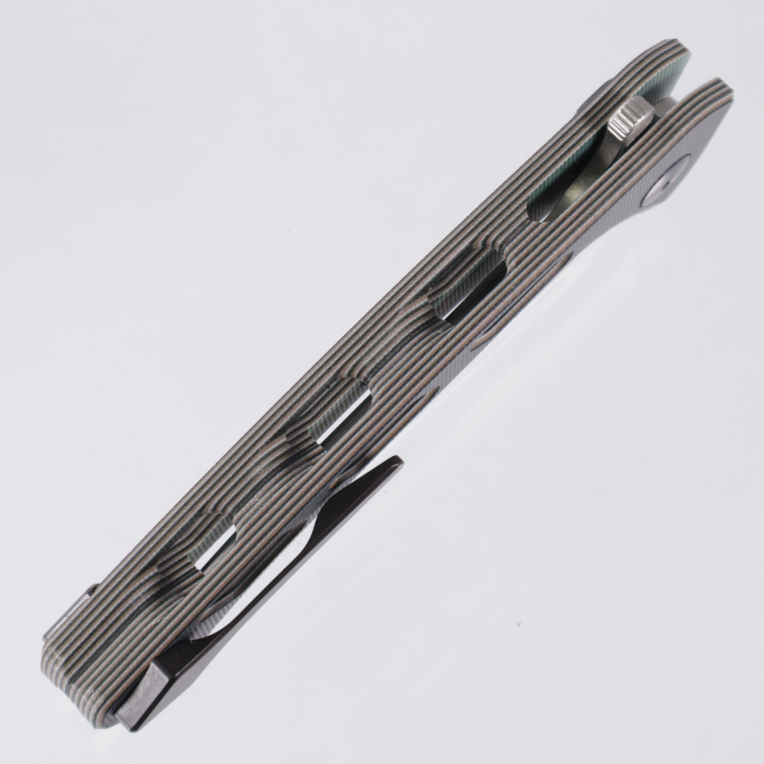 Dead Reckon Ridgeback Vertebrae - Flipper - MultiCamo G10 - Magnacut Clip Point - RB-3545-21