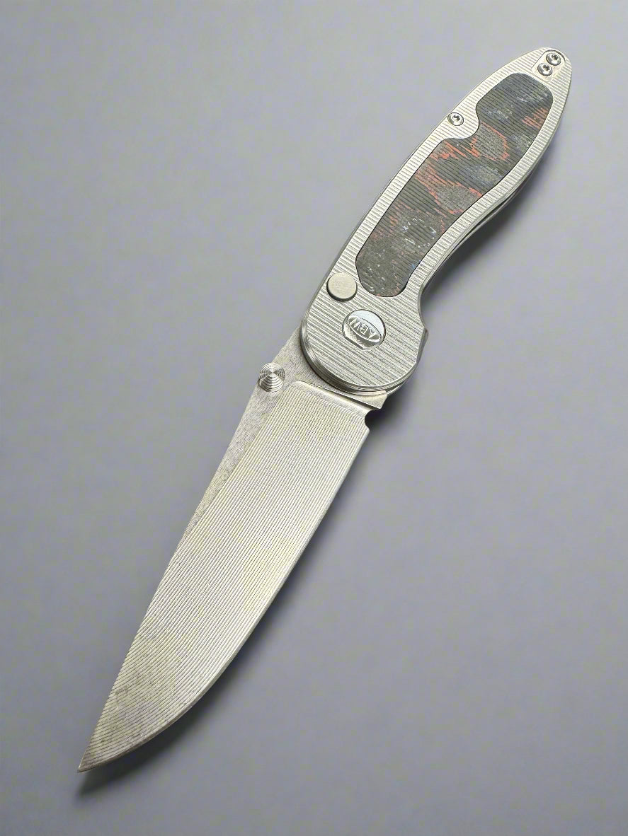 American Blade Works ABW MODEL 1 BUTTON LOCK TITANIUM Magnacut American Camo Carbon