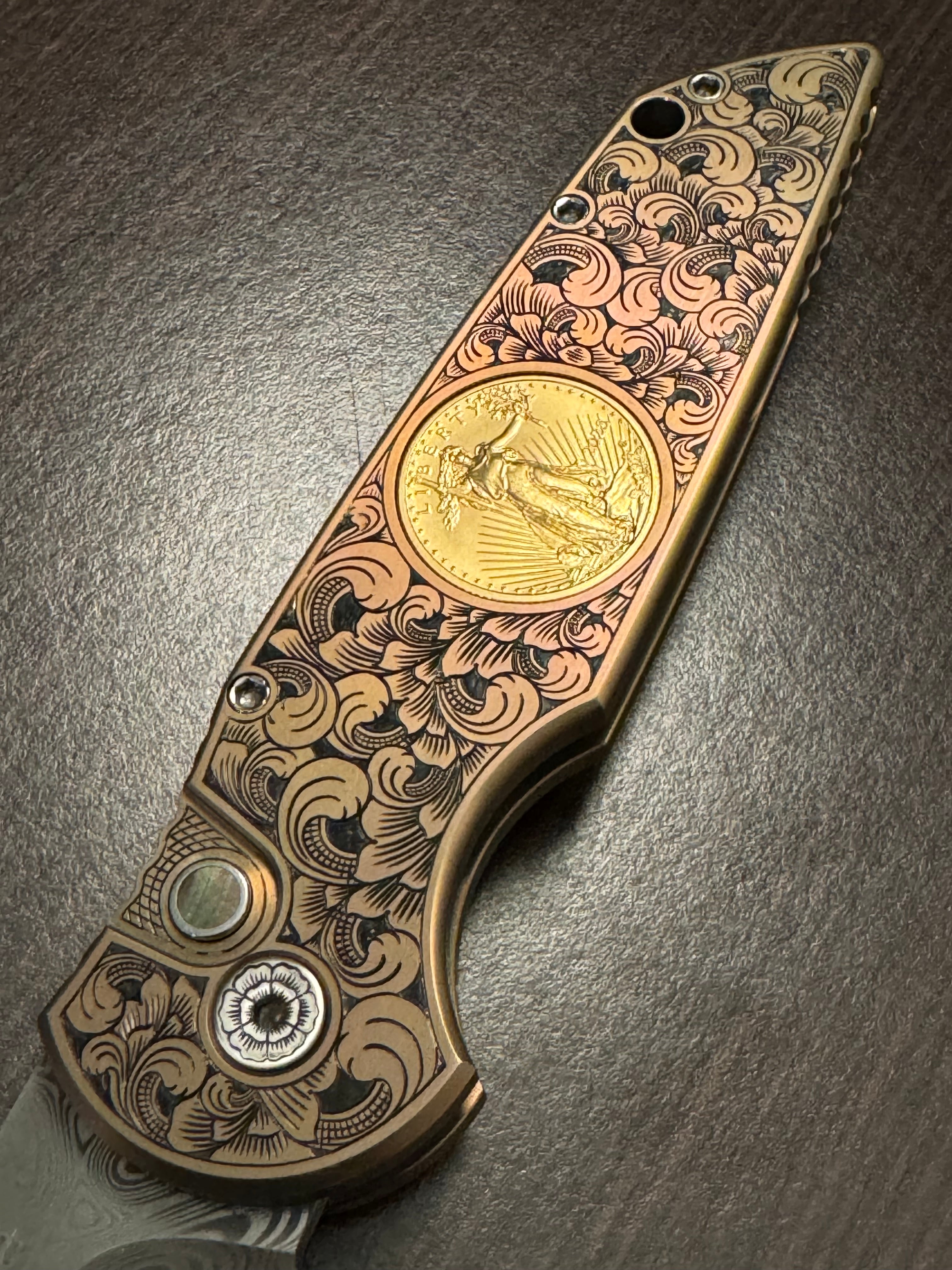 Protech Pro-Tech 2024 TR-3 Custom 002 Champagne Pink Ti Frame Bruce Shaw Hand Engraving with American Eagle Gold Coin, Irie Ground Damasteel Blade