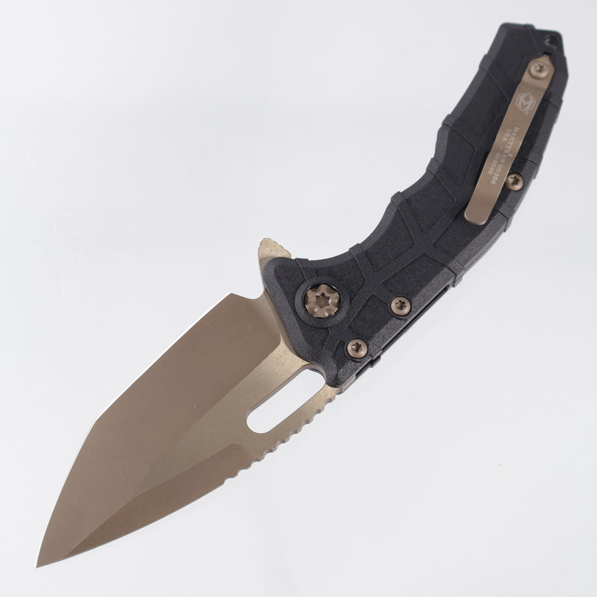 Heretic Martyr Buttonlock - Black Polymer - Bronze Battleworn Magnacut - H057-7A