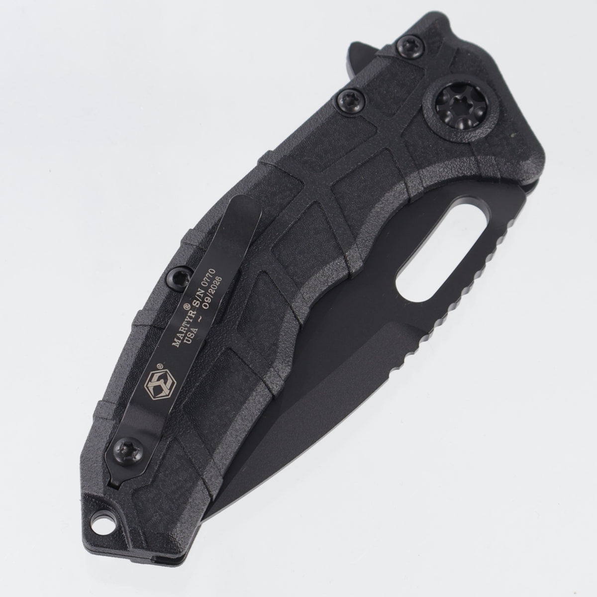 Heretic Martyr Buttonlock - Black Polymer - Black Tactical Magnacut - H057-4A-T