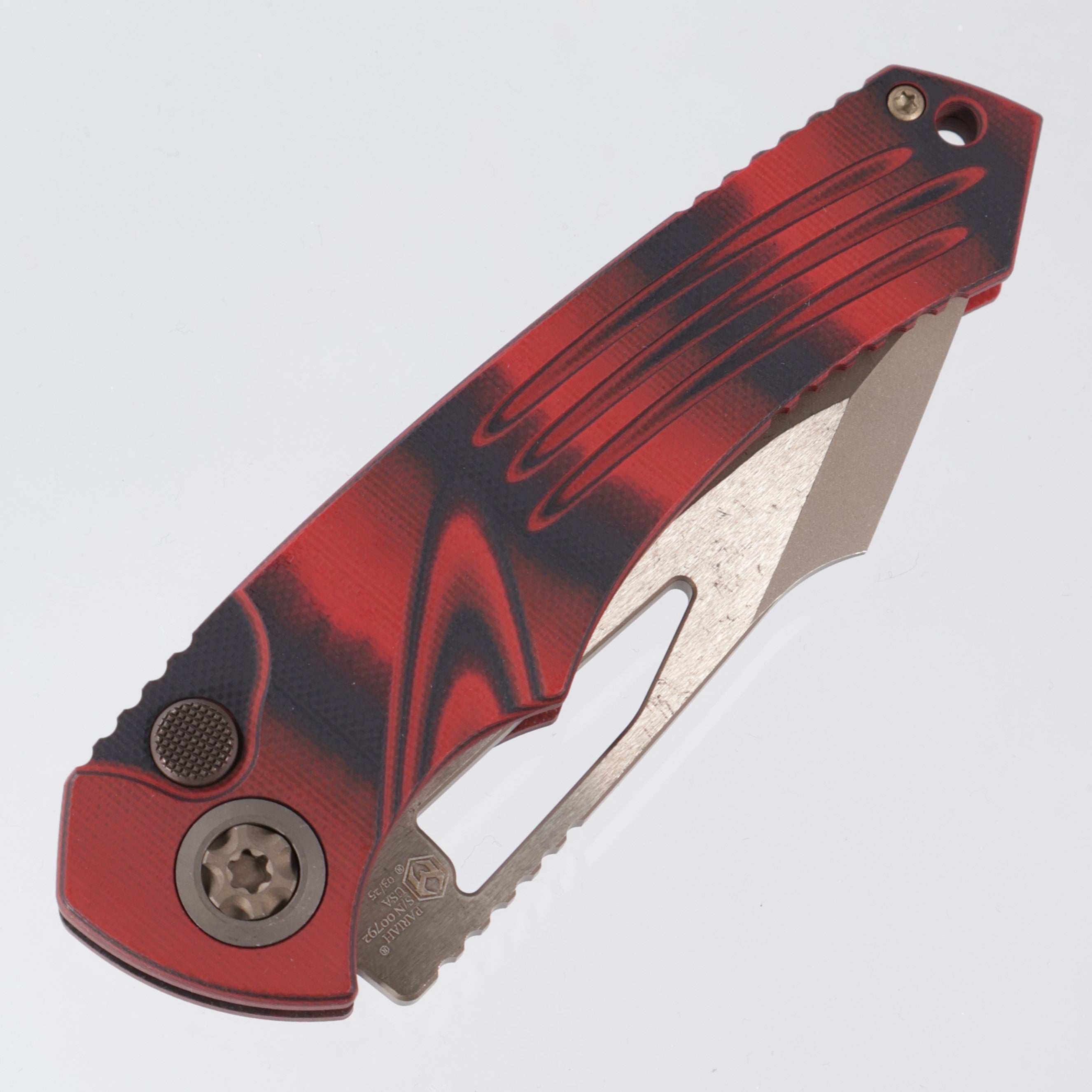 Heretic Pariah Manual - Red & Black G10 - Bronzed Magnacut - H046-7A-G10/RD