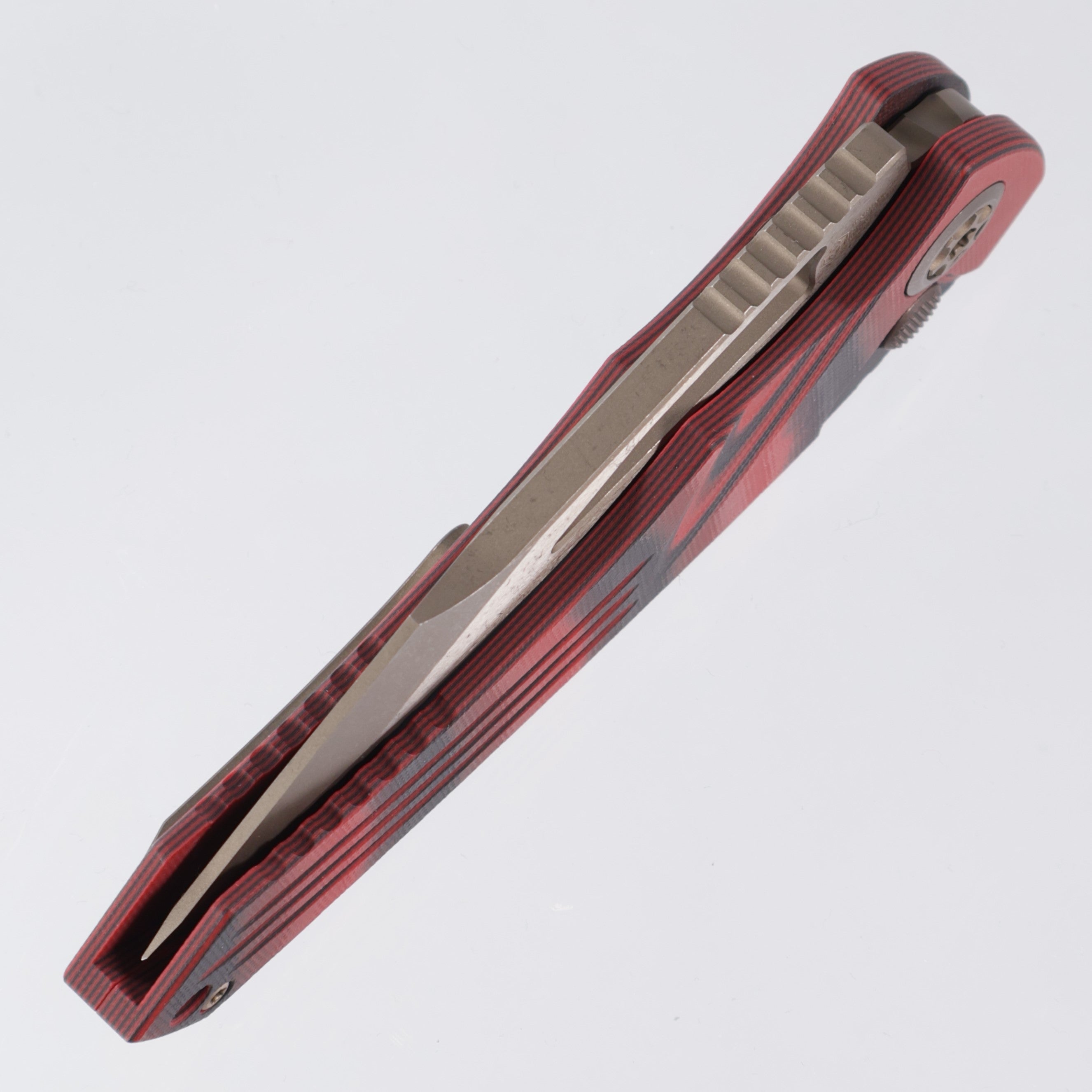 Heretic Pariah Manual - Red & Black G10 - Bronzed Magnacut - H046-7A-G10/RD