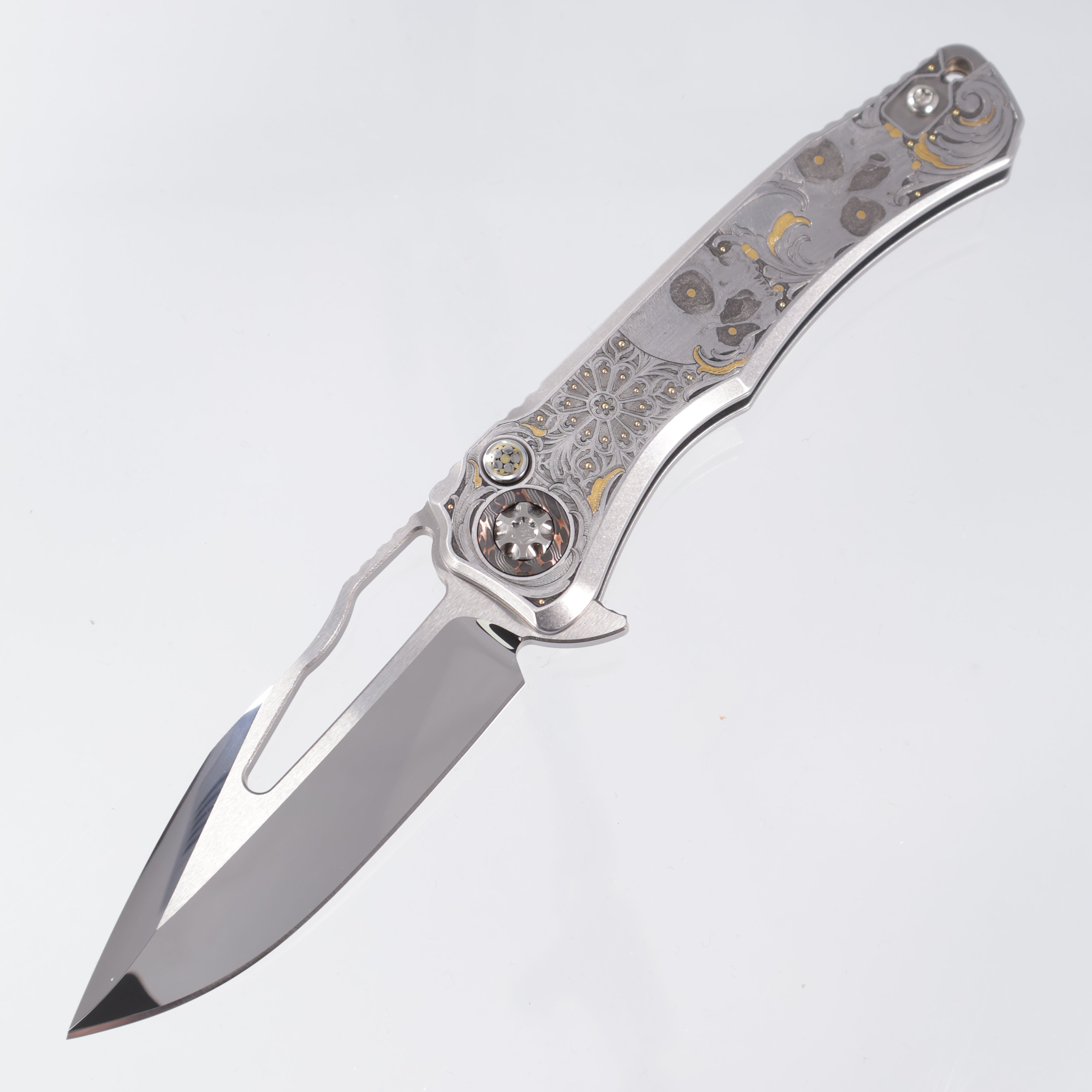 Heretic Wraith V4 Manual Custom 1 of 1 - Mirror Polish Clip Point - Hand Engraved Stainless Steel Chassis w/ Gold Embellishments by Gabriel Keeling, Damascus Pivot Collars & Mosaic Pin button inlay