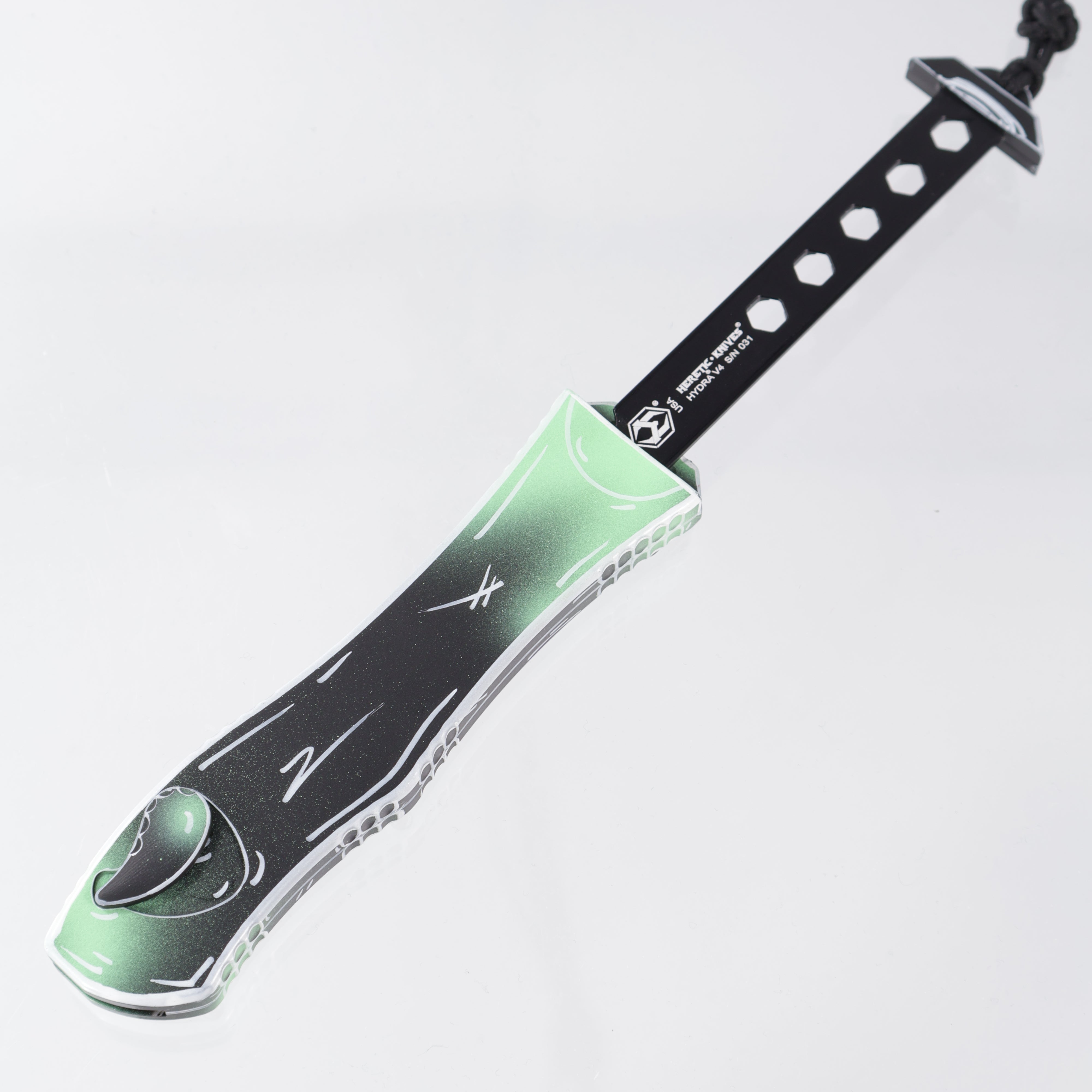Heretic  Hydra V4 Tanto - UV Reactive Toxic Green Negative Cel-Shade - Magnacut - H406-NCS-TX