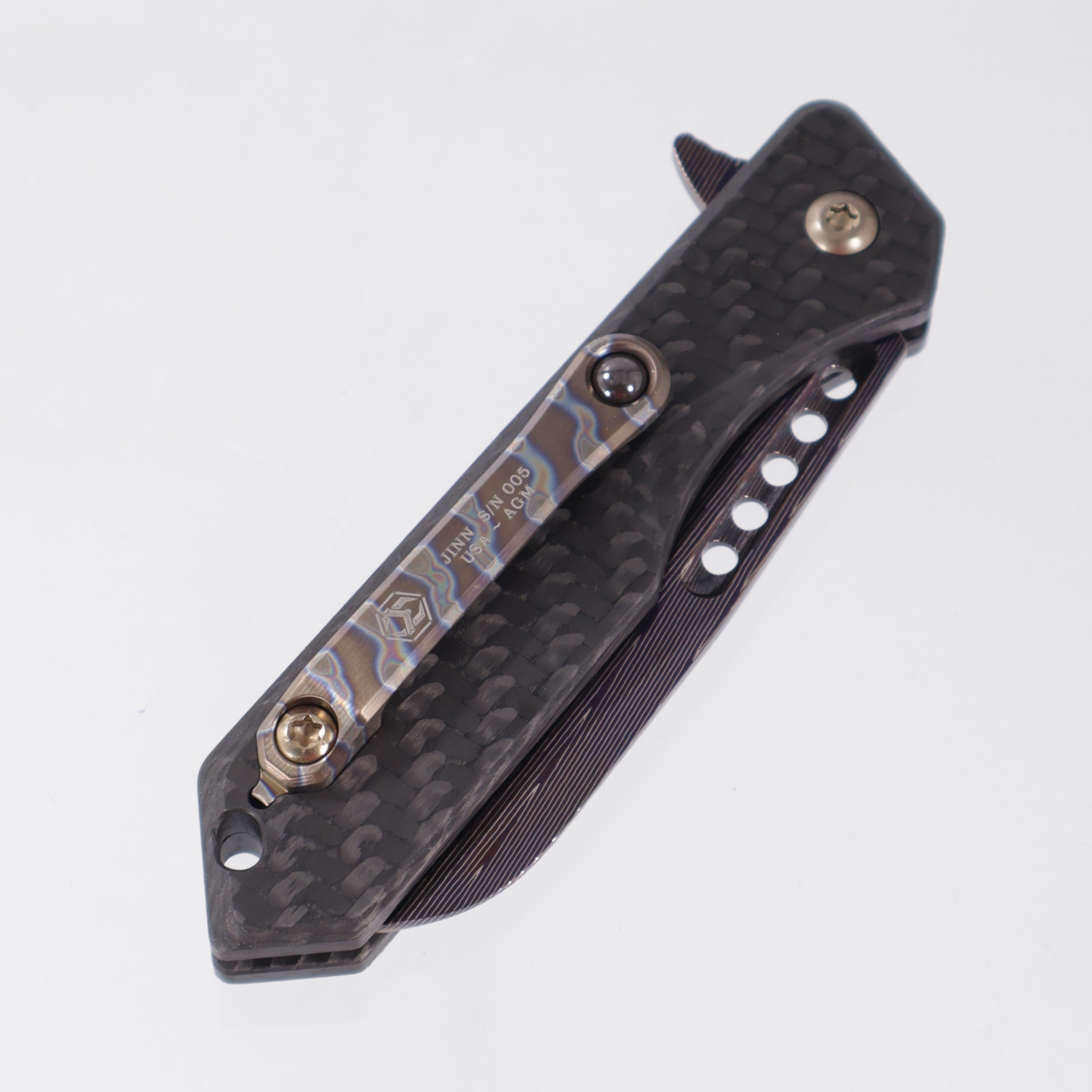 Heretic Jinn Manual Custom - Blue Vegas Forge Herringbone Damascus - Carbon Fiber Chassis w/ Flamed Titanium Clip & Bronze Hardware