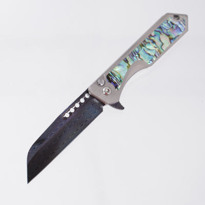 Heretic Jinn Manual Custom - Blue Vegas Forge Herringbone Damascus - Hefted Titanium Chassis w/ Abalone inlays
