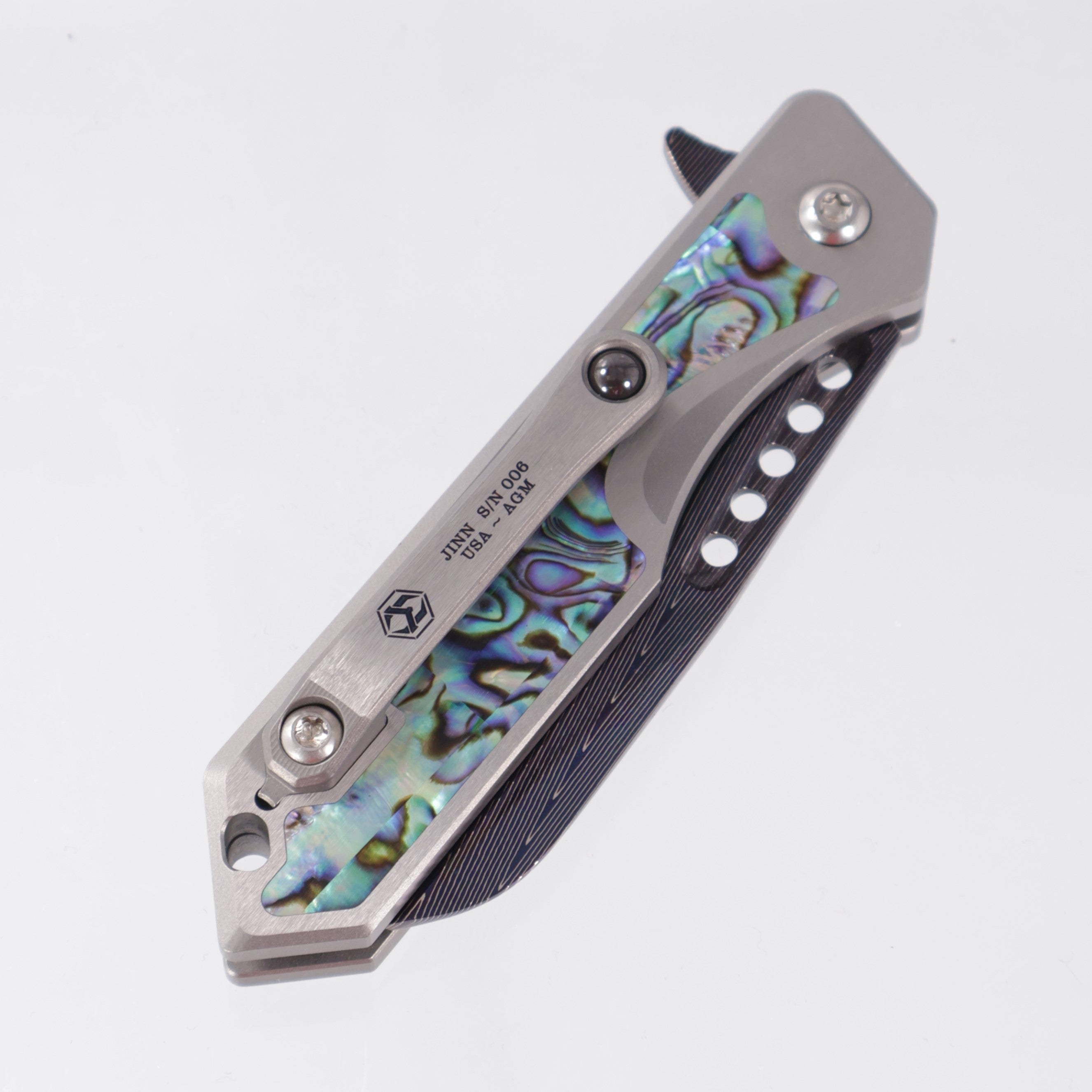 Heretic Jinn Manual Custom - Blue Vegas Forge Herringbone Damascus - Hefted Titanium Chassis w/ Abalone inlays