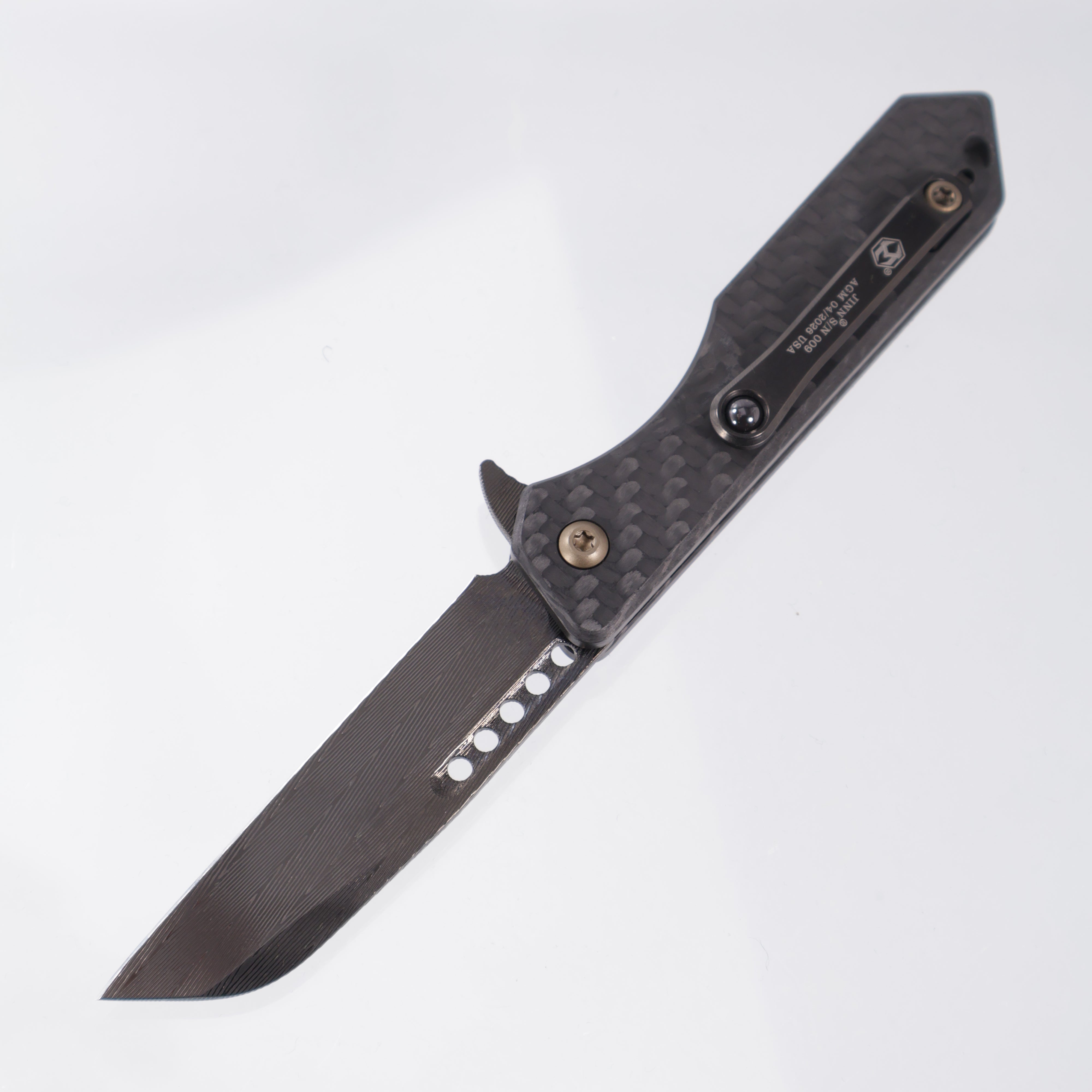 Heretic Jinn Manual Custom - Carbon Fiber Chassis w/ Bronze Ano Hardware - DLC Vegas Forge Herringbone