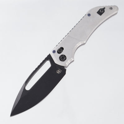 Heretic Koschei - Blizzardworn Aluminum w/ Blue Ti Hardware - Battle Black Magnacut - H061-8A-BLZ