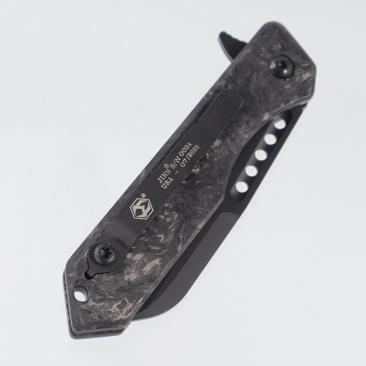 Heretic Jinn Manual - Marbled Glow Carbon Fiber - DLC Full Serrate Magnacut - H213-6C-MGCF
