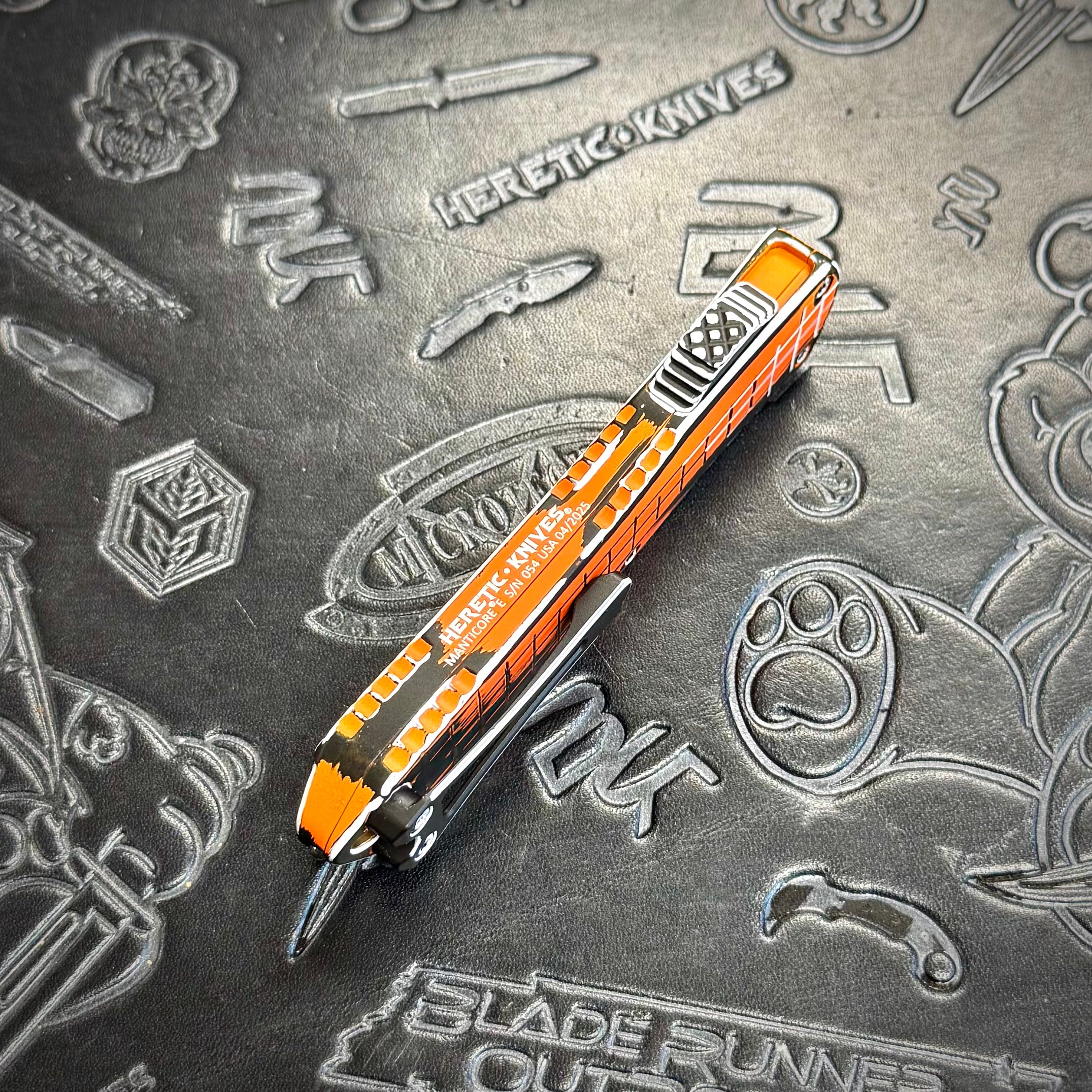 Heretic Manticore E - Double Edge Orange Cel Shade