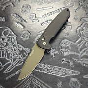Protech Rockeye 1-off Cerakote - Black handle w/ Black Lip Pearl button inlay - OD Green blade