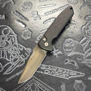 Protech Rockeye 1-off Cerakote - Black handle w/ Black Lip Pearl button inlay - Battleworn OD Green blade