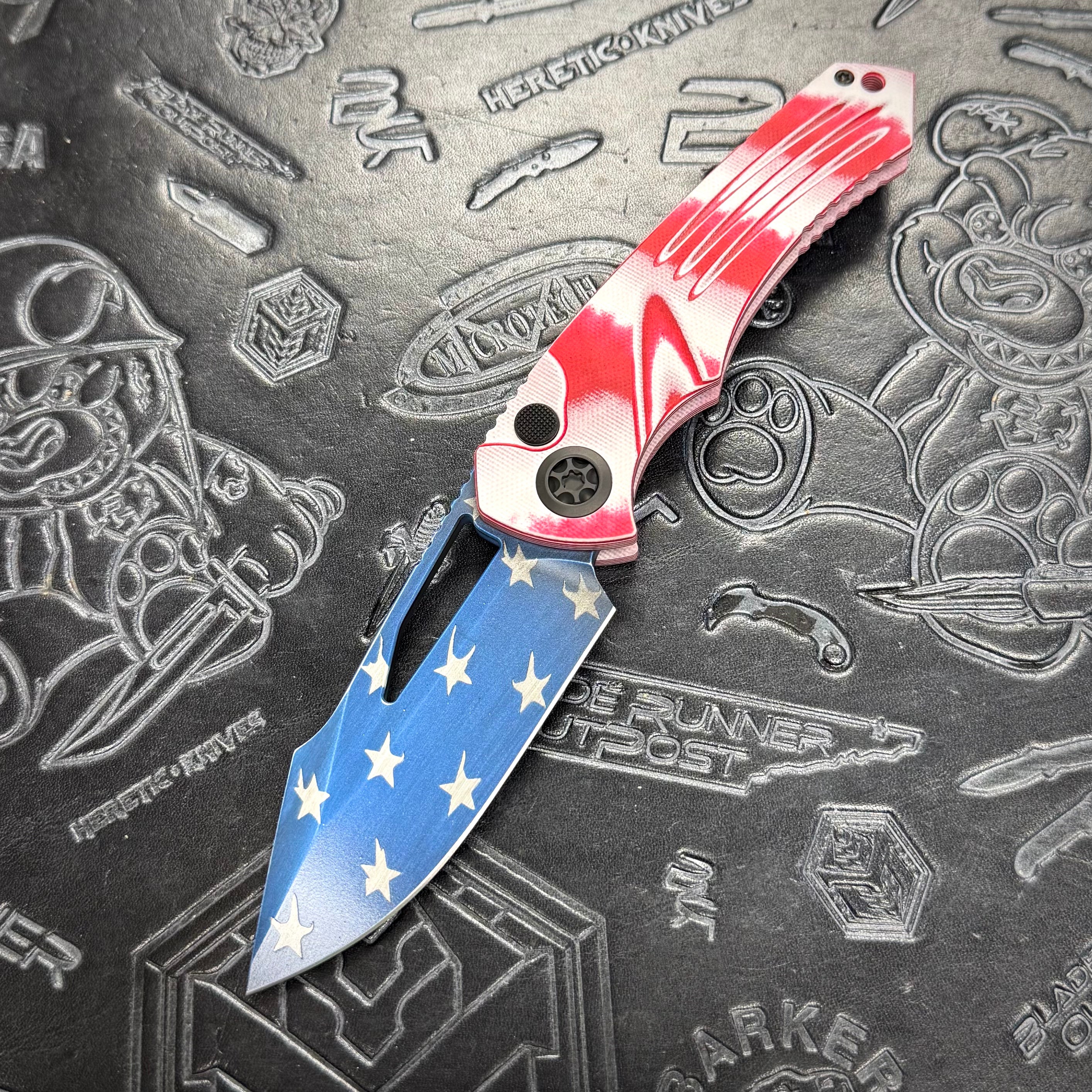 Heretic Pariah Manual - Red/White G10 - USA Cerakote Drop Point H046-STARS-STRIPES