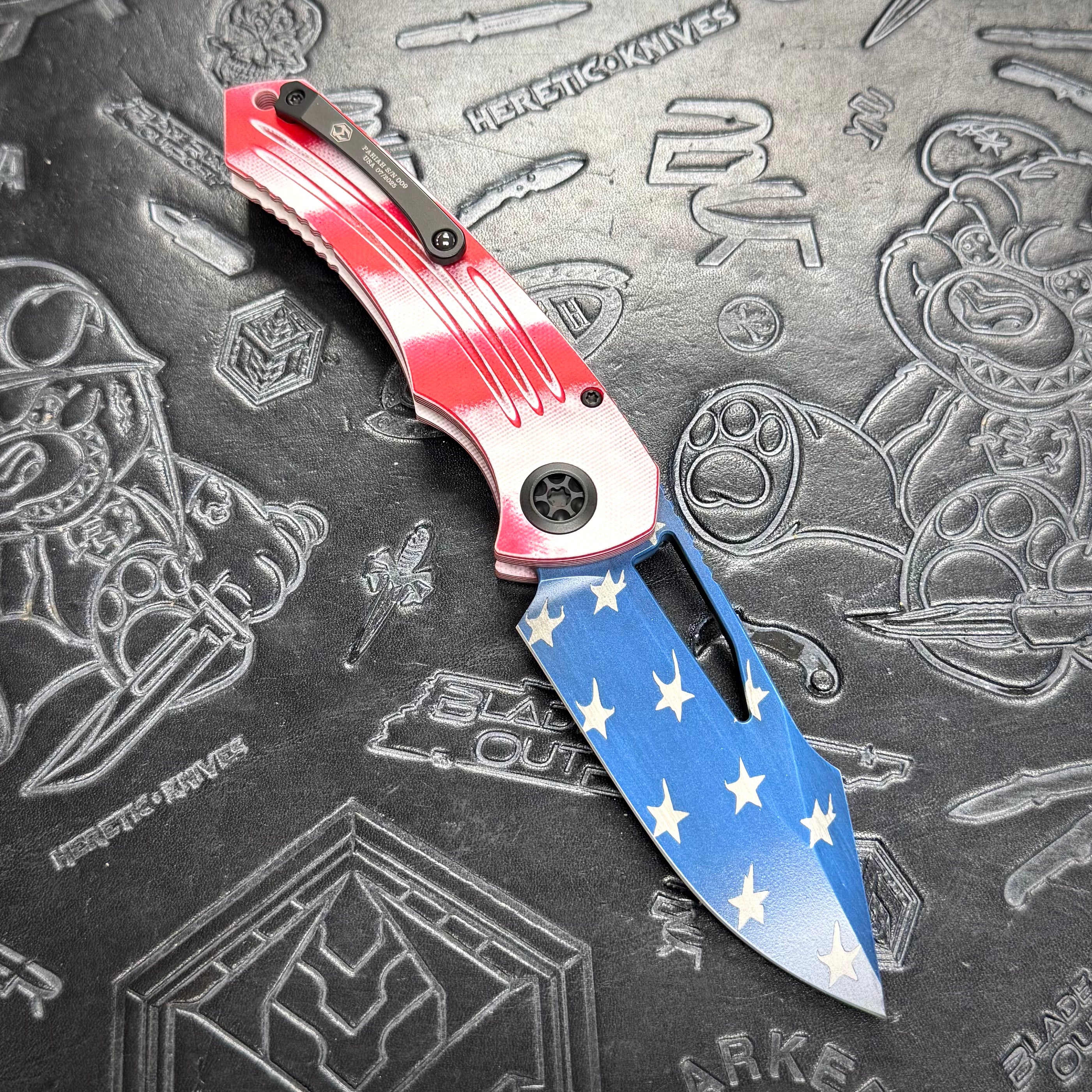 Heretic Pariah Manual - Red/White G10 - USA Cerakote Drop Point H046-STARS-STRIPES