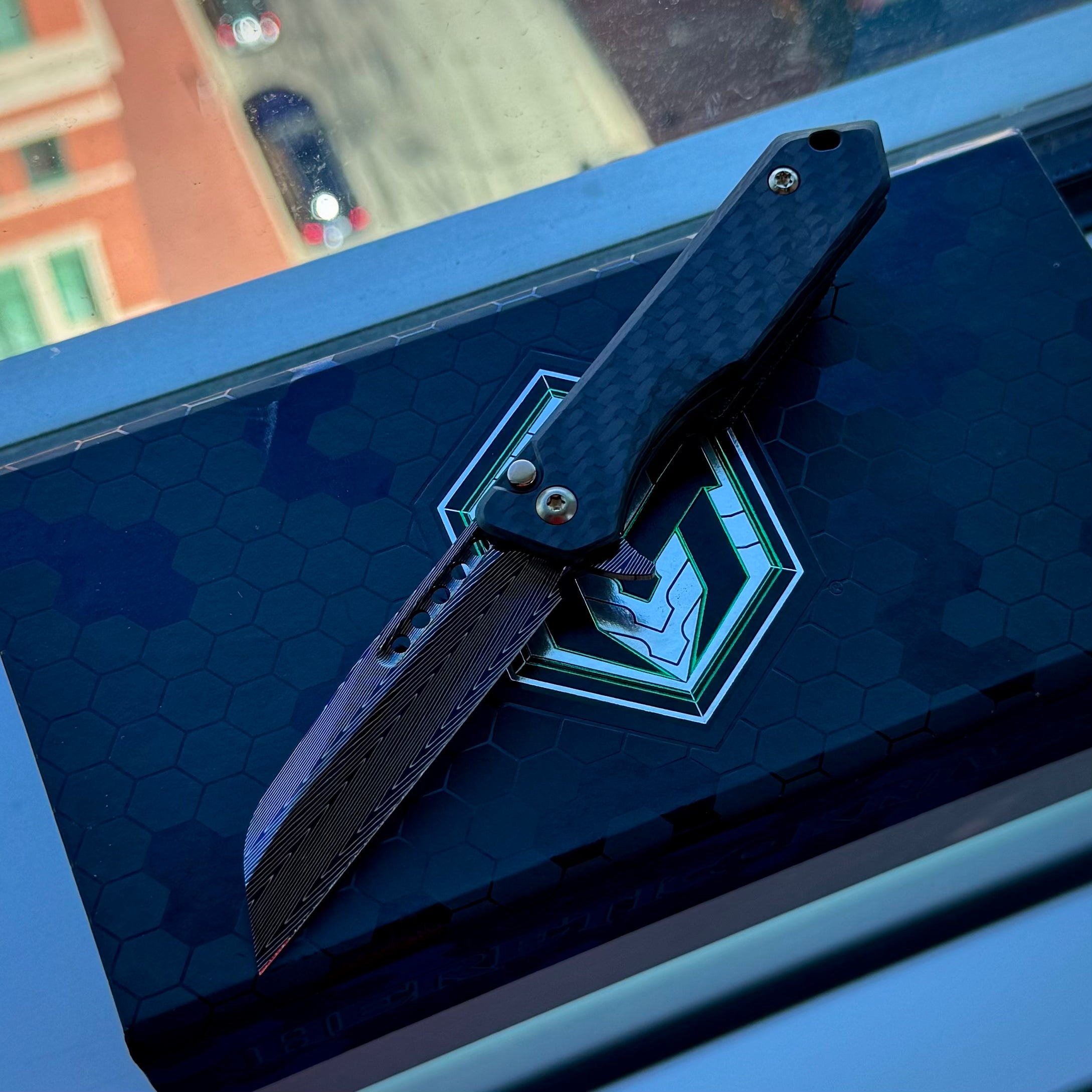 Heretic Jinn Manual Custom - Blue Vegas Forge Herringbone Damascus - Carbon Fiber Chassis w/ Flamed Titanium Clip & Bronze Hardware