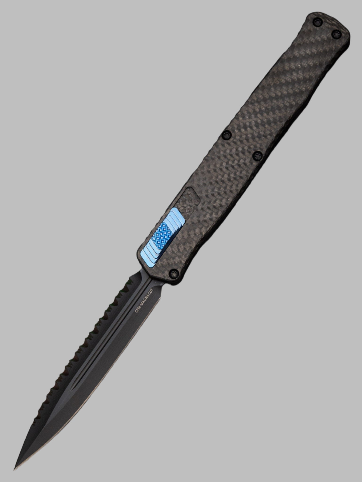 Heretic Knives Cleric II - Black ANO Chassis w/ Carbon Fiber inlay, Carbon Fiber Top Cover, DLC Double Edge FULL SERRATED Magnacut blade, Blue Ti Button and Blue Ti Clip H020-6C-CF/BLU *