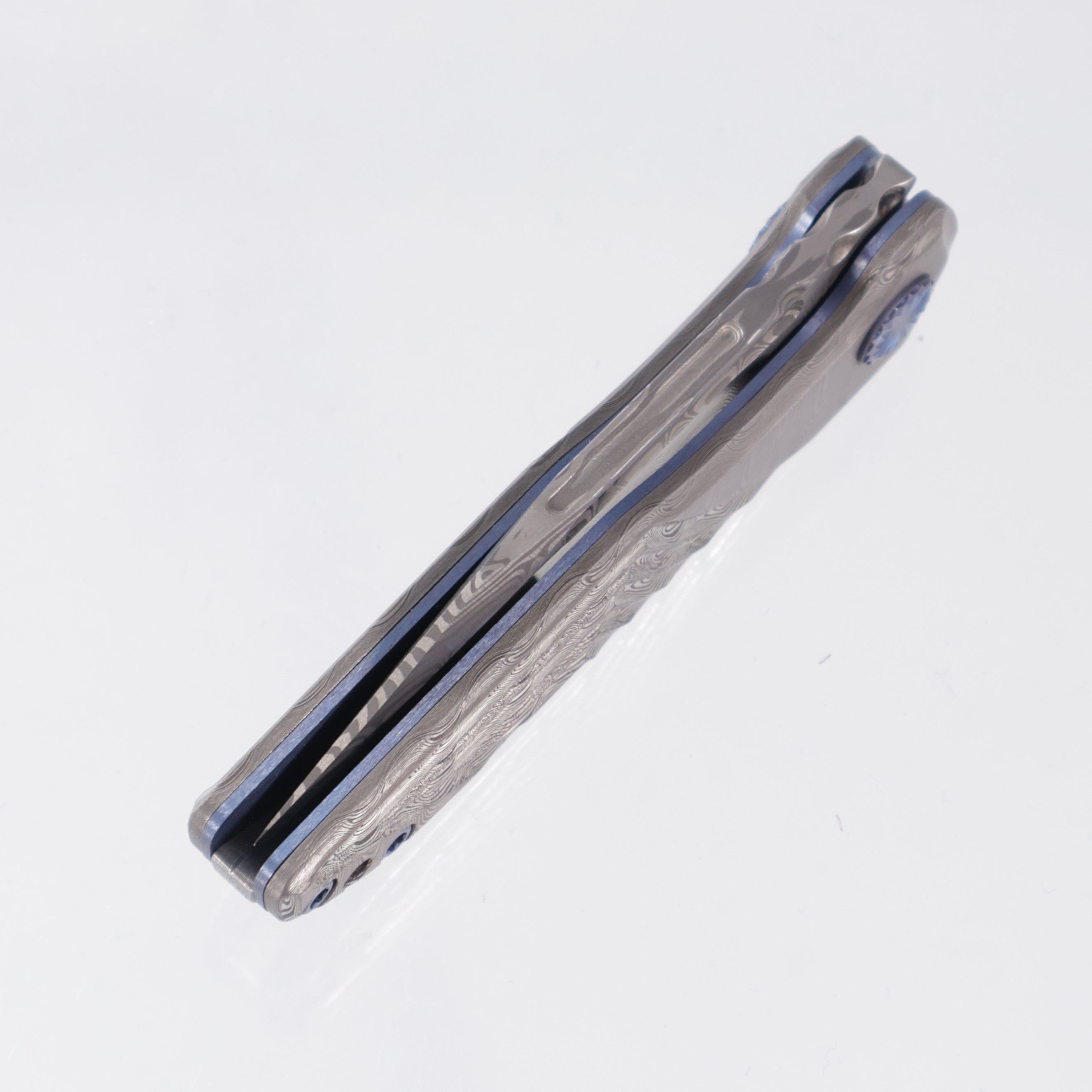 JB Stout Slick Leg Double Detent - Damasteel Scales w/ Blue Titanium Liners & Hardware - Damasteel Blade