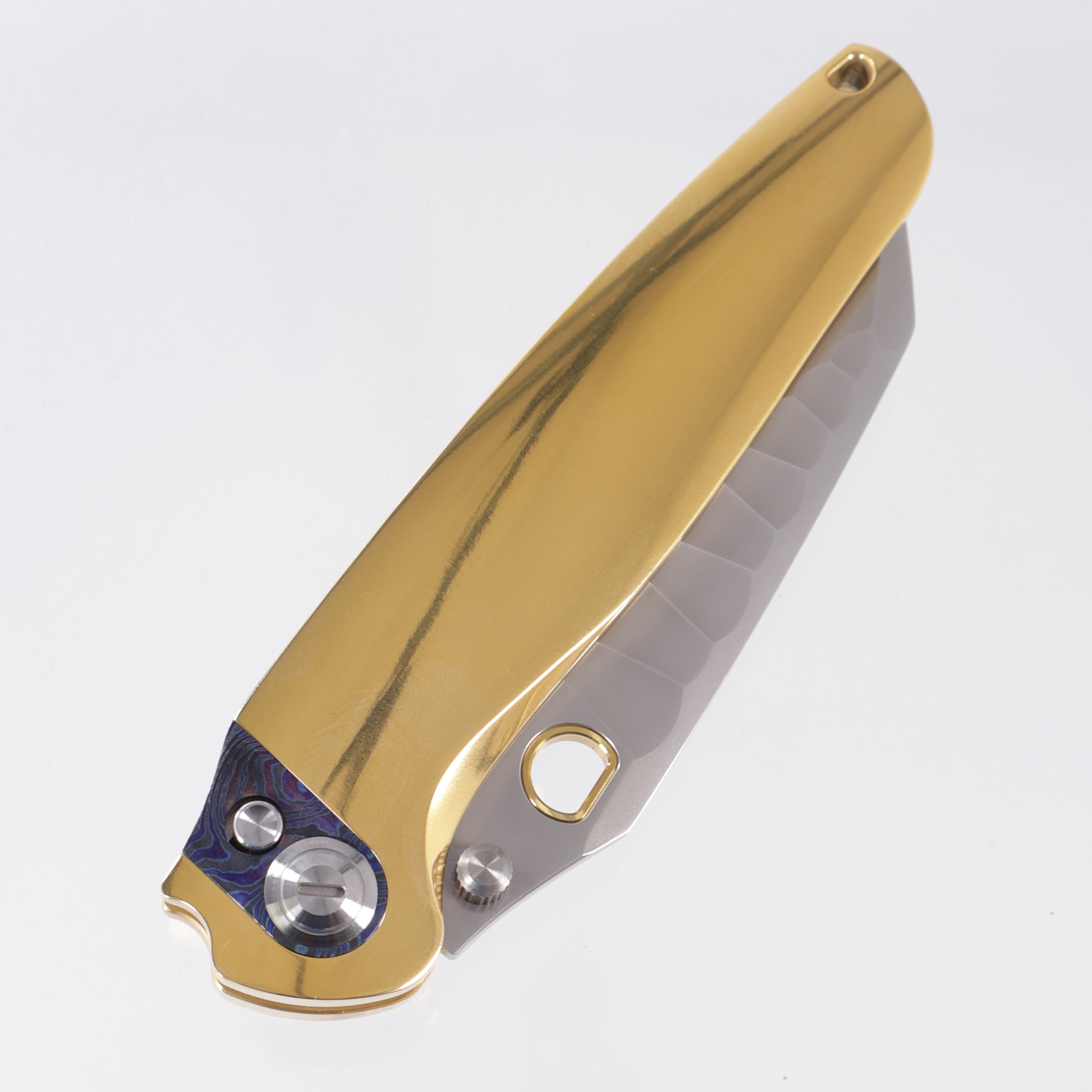 Ketuo Dirty Bird - High Polish Gold Titanium w/ ZircuTi Pivot Collar - Pearlescent M390 w/ Rock Pattern - G