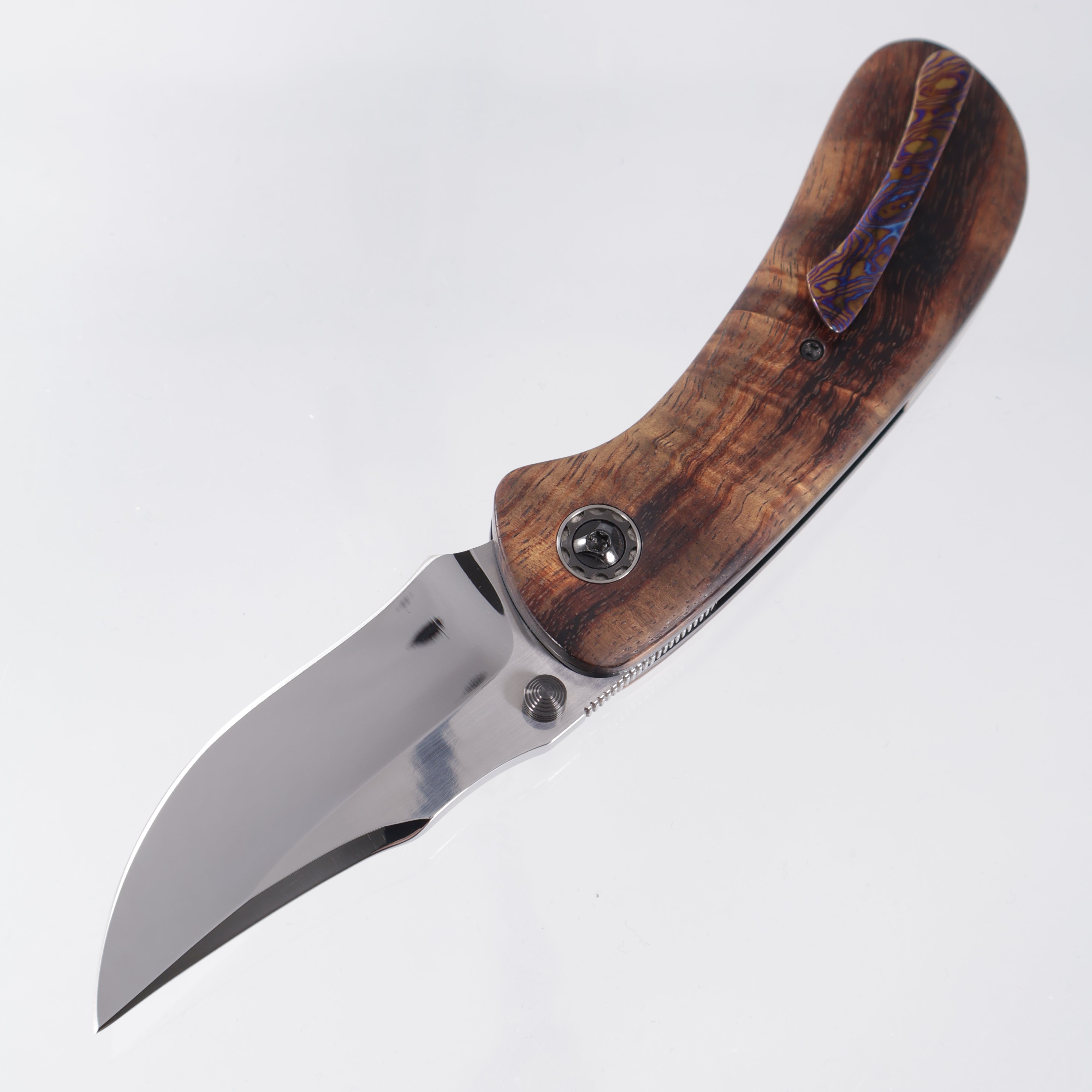 W. Guinn Knives Bezalel Bowie Folder - Stabilized Hawaiian Curly Koa Wood w/ Timascus Backspacer & Clip - Mirror Polish AEB-L