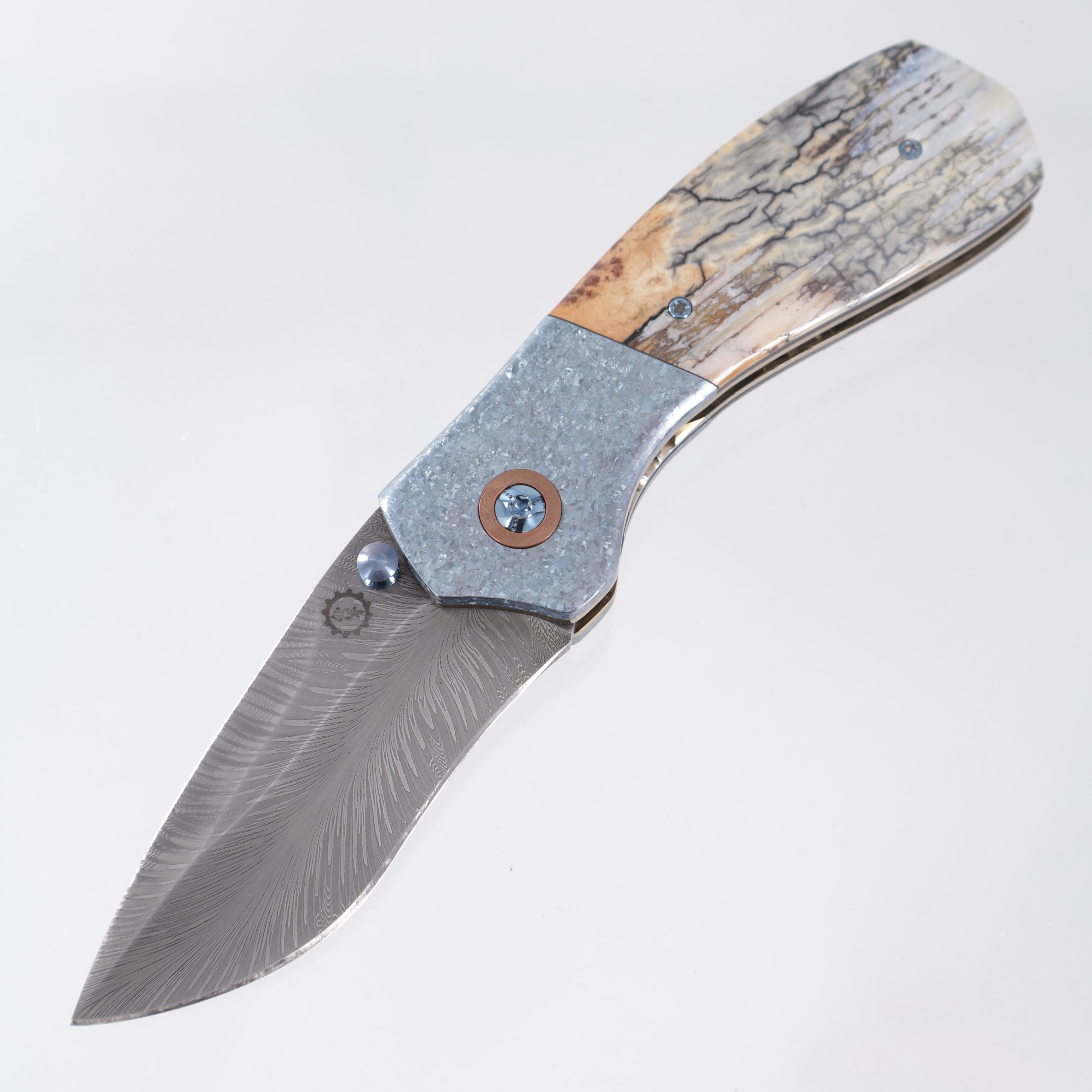 W. Guinn Knives Ebenezer Folder #5 - Ice Blue Crystalized Titanium & Mammoth w/ Copper Pivot Collars - Bulldog Thunder Chicken Damascus