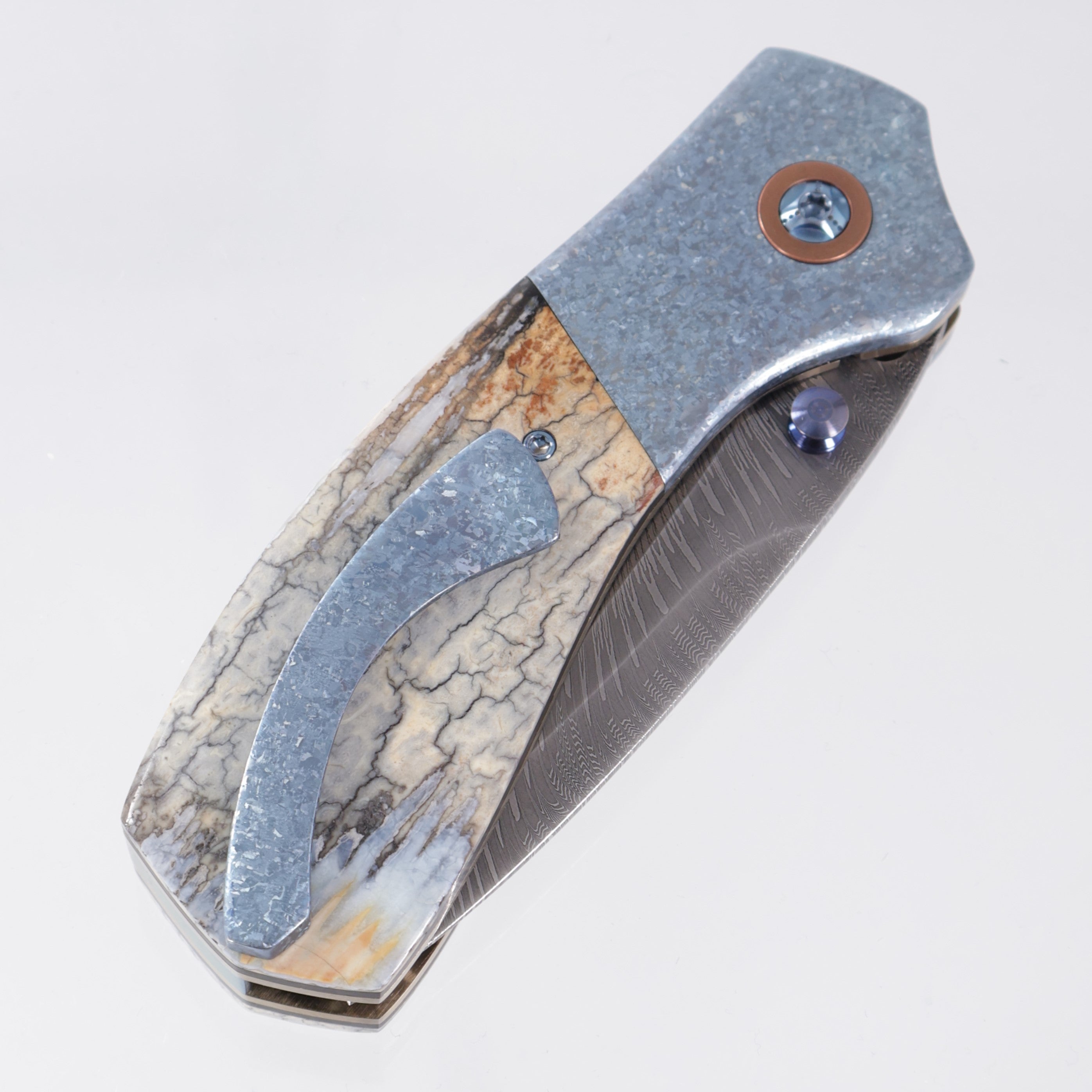 W. Guinn Knives Ebenezer Folder #5 - Ice Blue Crystalized Titanium & Mammoth w/ Copper Pivot Collars - Bulldog Thunder Chicken Damascus