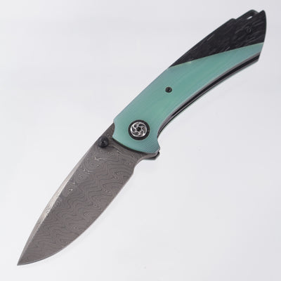Melvin Lozada Apollo 3.5" - Emerald G10 / Black Glass / Shredded Carbon Scales w/ Zirconium Clip - Mike Norris Damascus Blade