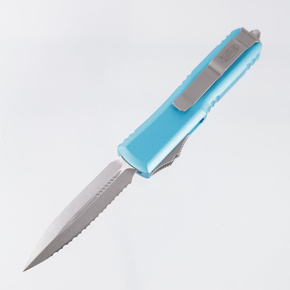 Microtech UTX-85 Double Edge - M390 Stonewash, Full Serrate - Turquoise Aluminum - 232-12 TQ