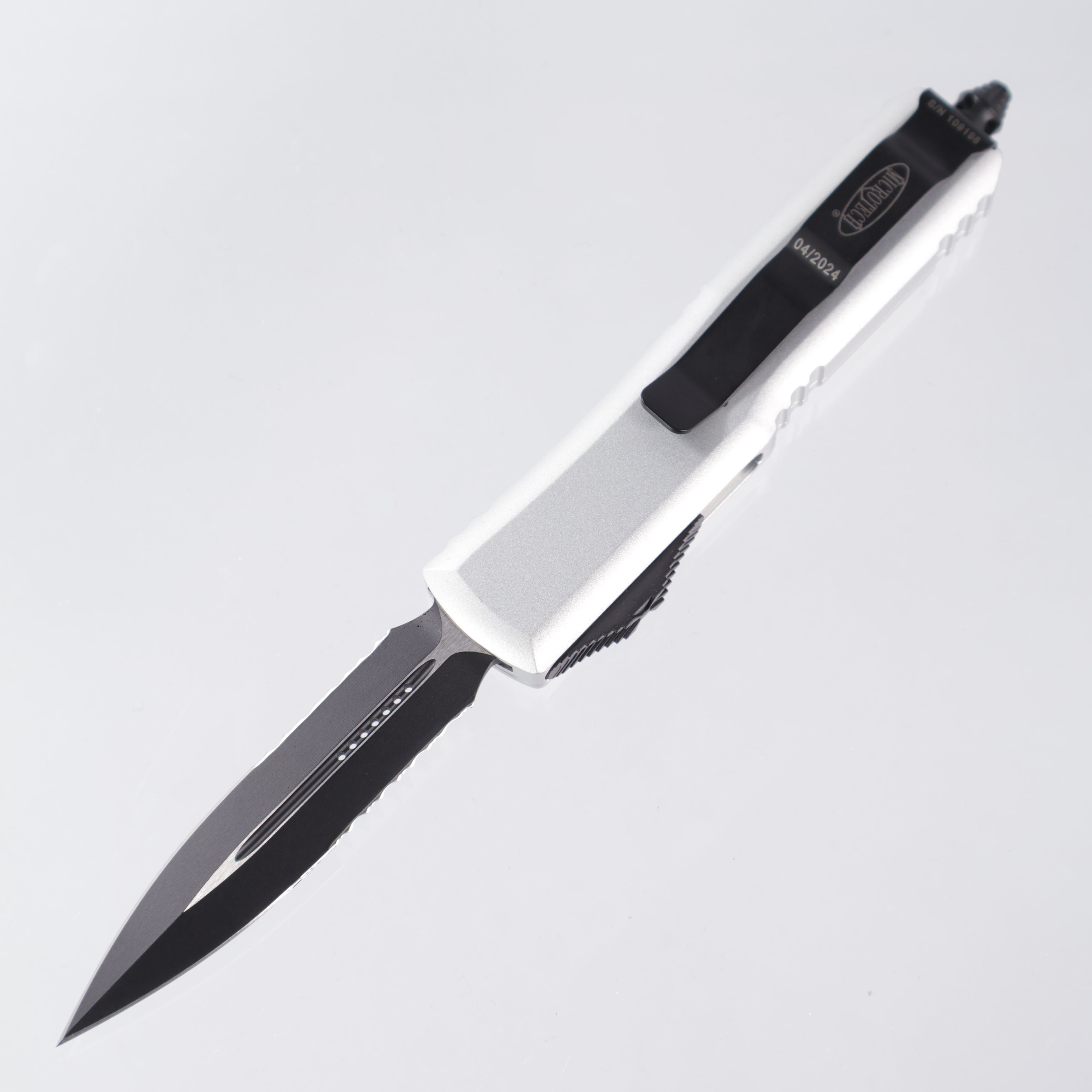 Microtech UTX-85 - Clear Aluminum Handle - Black Double Edge, Partial Serrate M390 - 232-2 CR
