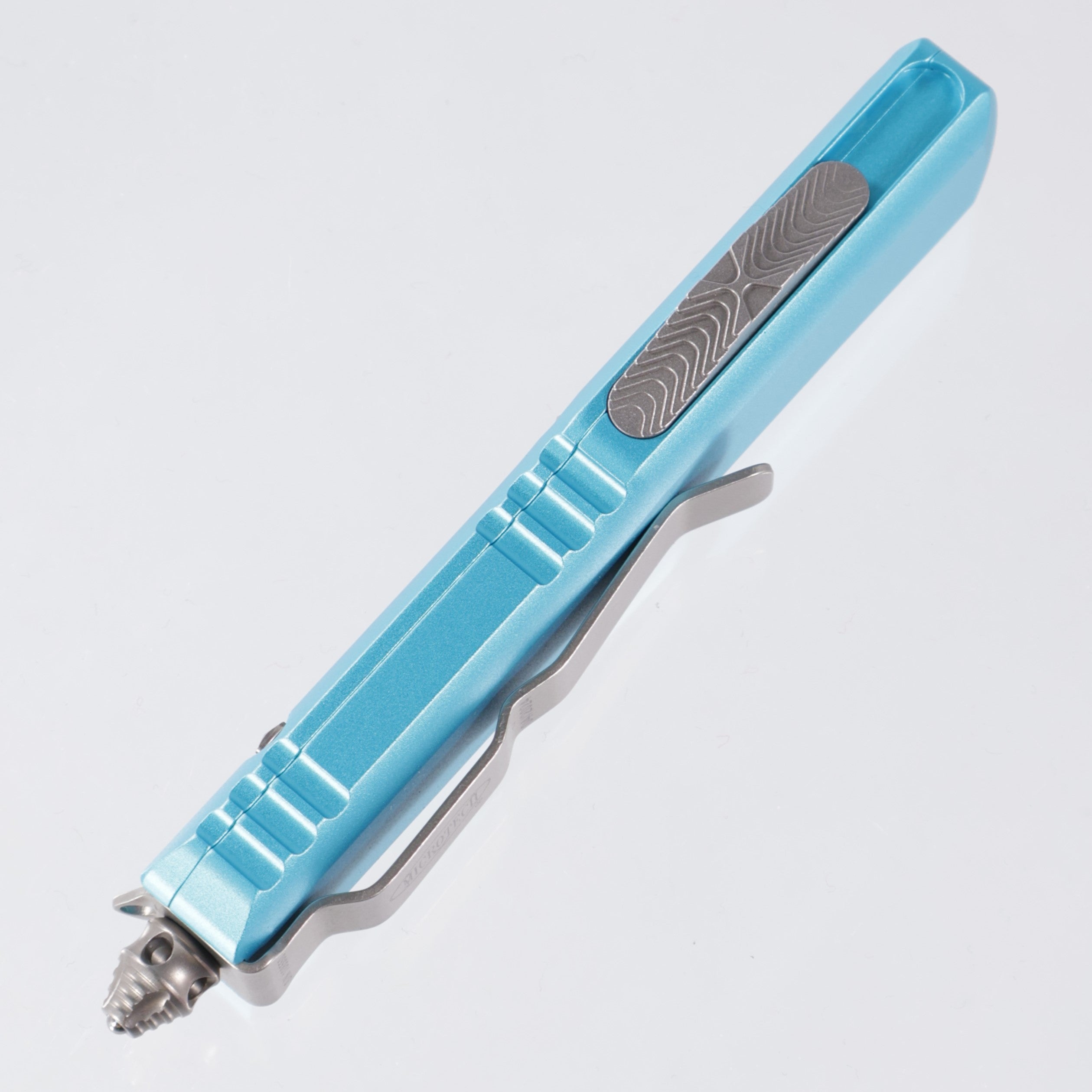 Microtech UTX-85 - Turquoise Aluminum - Satin Double Edge, Full Serrated M390 - 232-6 TQ