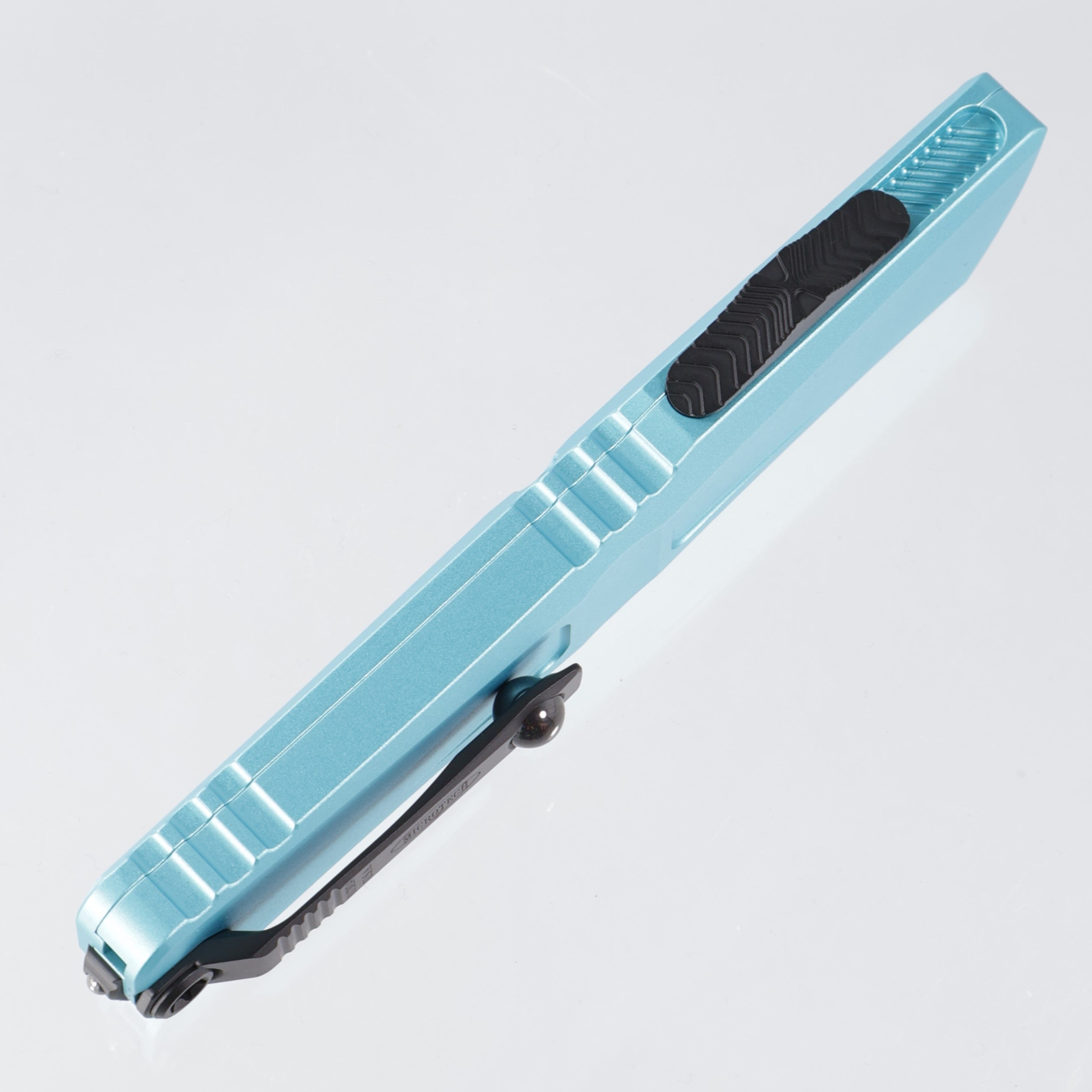 Microtech Combat Troodon Gen 3 - Double Edge Black, Full Serrate M390MK - Turquoise Aluminum - Gen III 1142-3 TQ