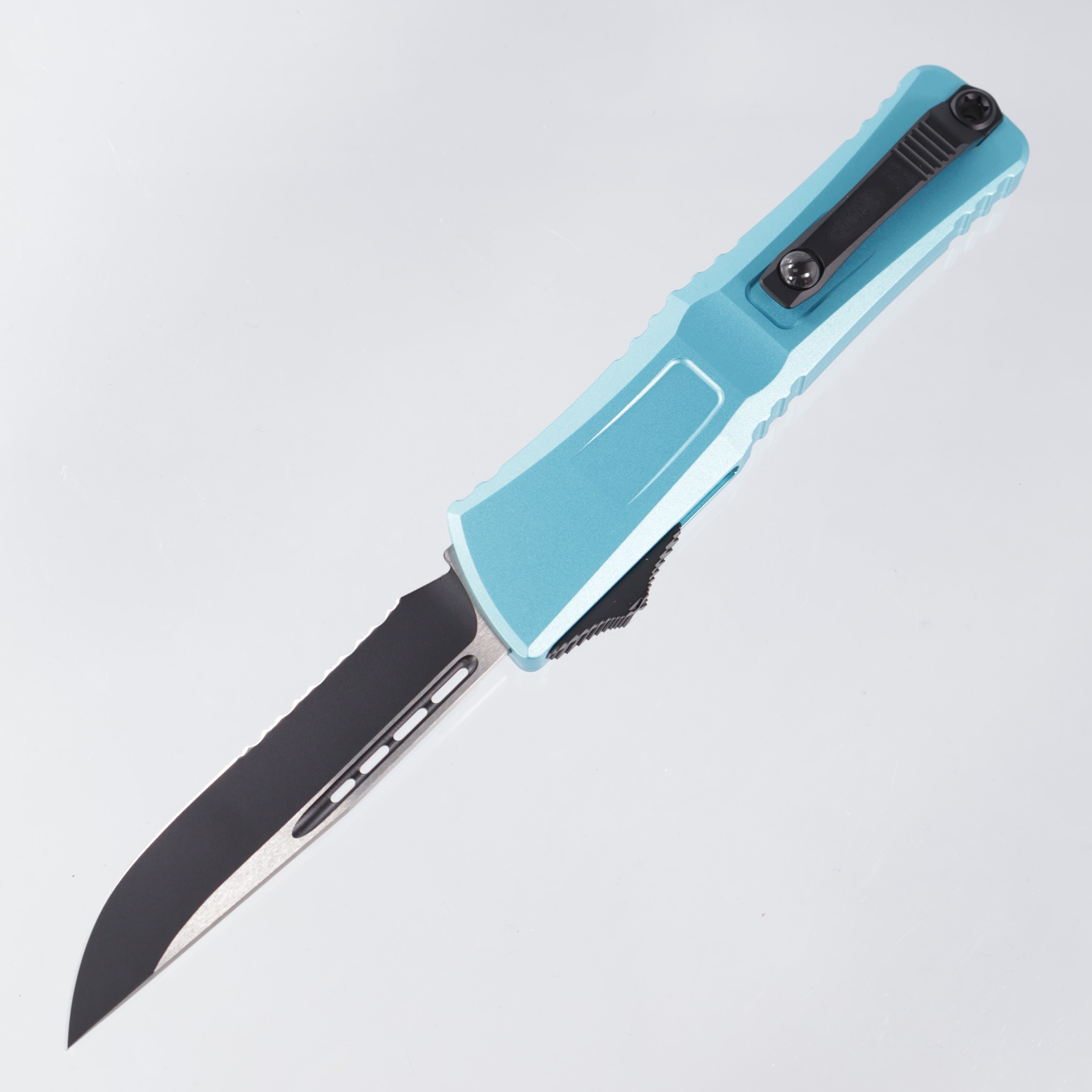 Microtech Combat Troodon Gen 3 - Single Edge Black, Partial Serrate M390MK - Turquoise Aluminum - Gen III 1143-2 TQ