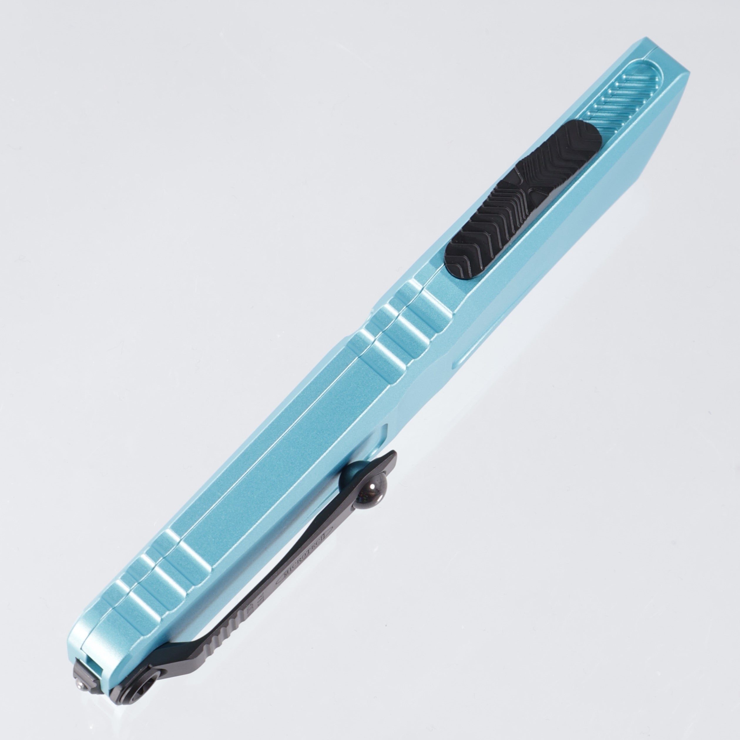 Microtech Combat Troodon Gen 3 - Single Edge Black, Partial Serrate M390MK - Turquoise Aluminum - Gen III 1143-2 TQ