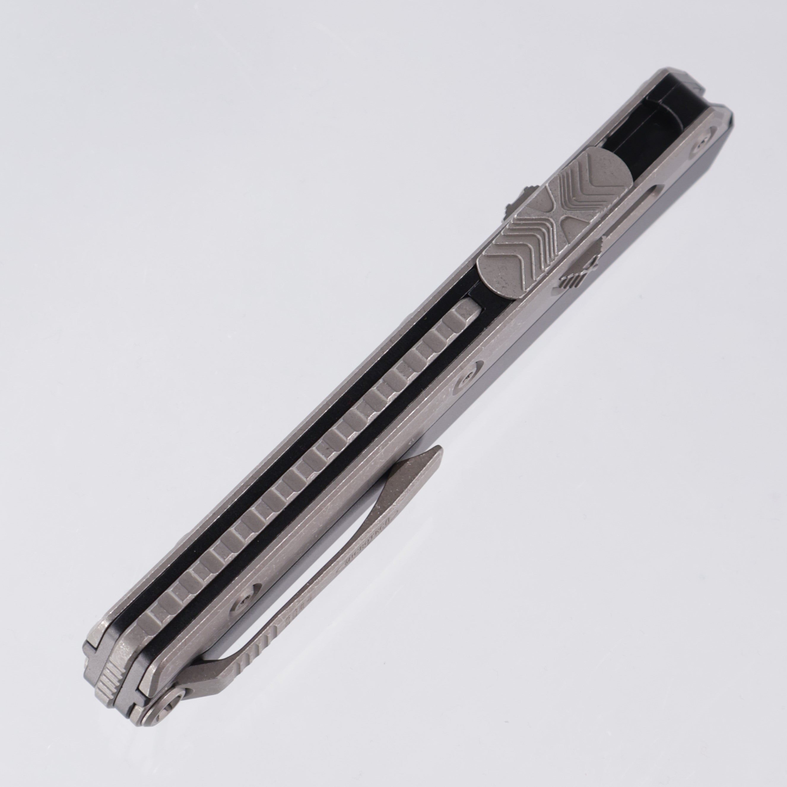 Microtech Glykon - Tanto Apocalyptic, Full Serrate M390 - Black Aluminum w/ Titanium Overlay - Nickel Boron Internals - 185-12 AP