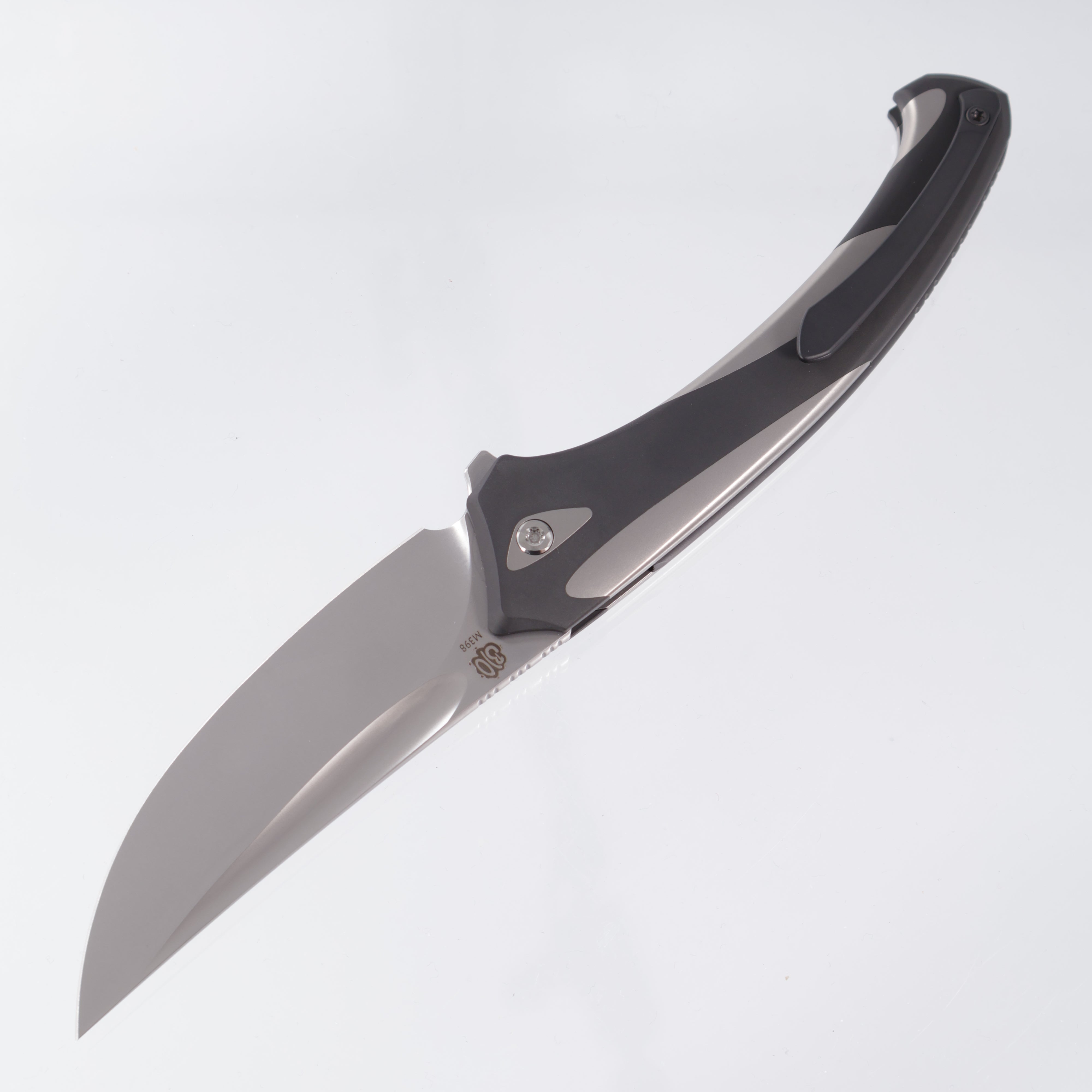 Poikilo Orca - Pearlescent Stonewash M398 - Ti & Blackened Ti Coated Handle - S