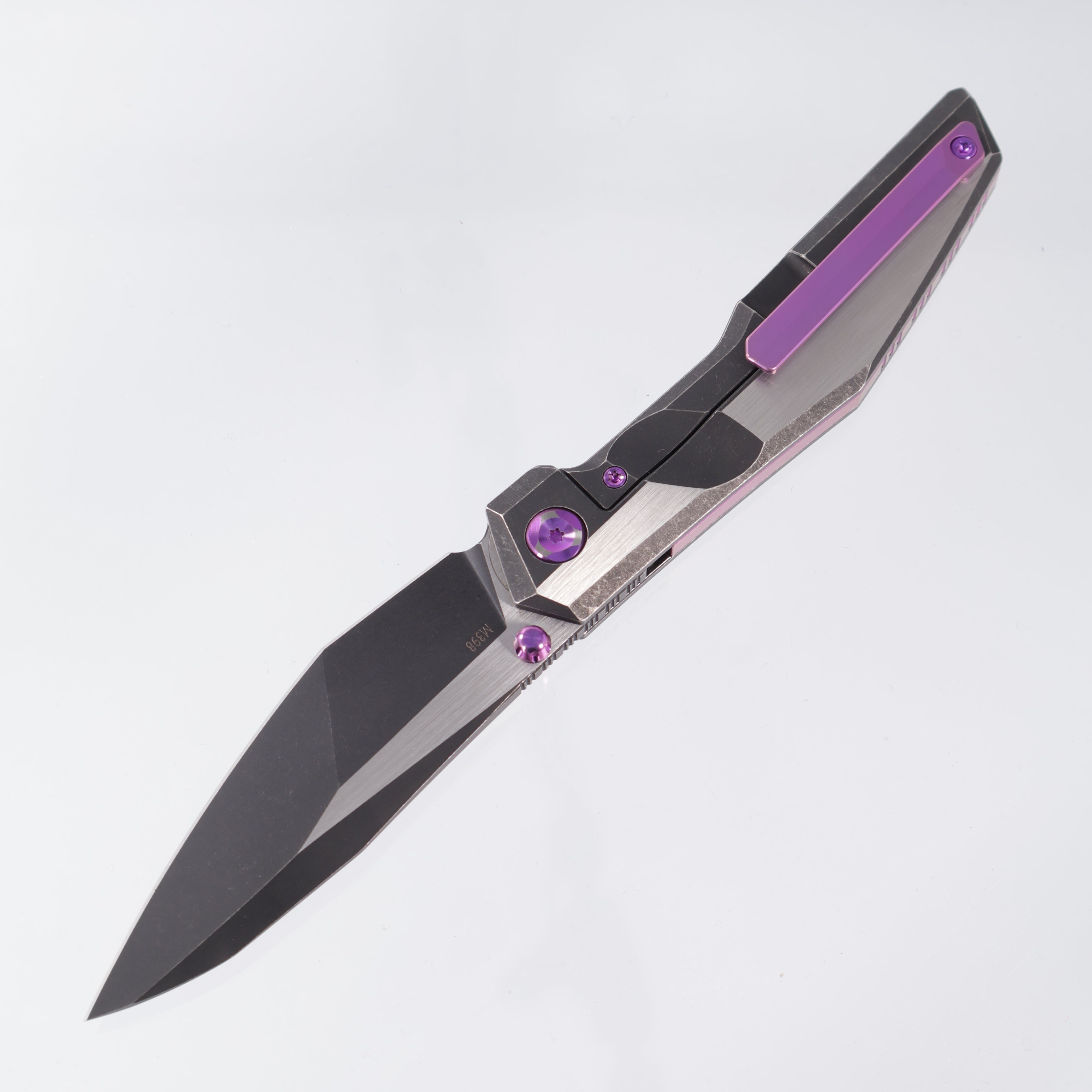 Poikilo Komodo - Dark Stonewash M398 - Ti with Purple Anodization - S