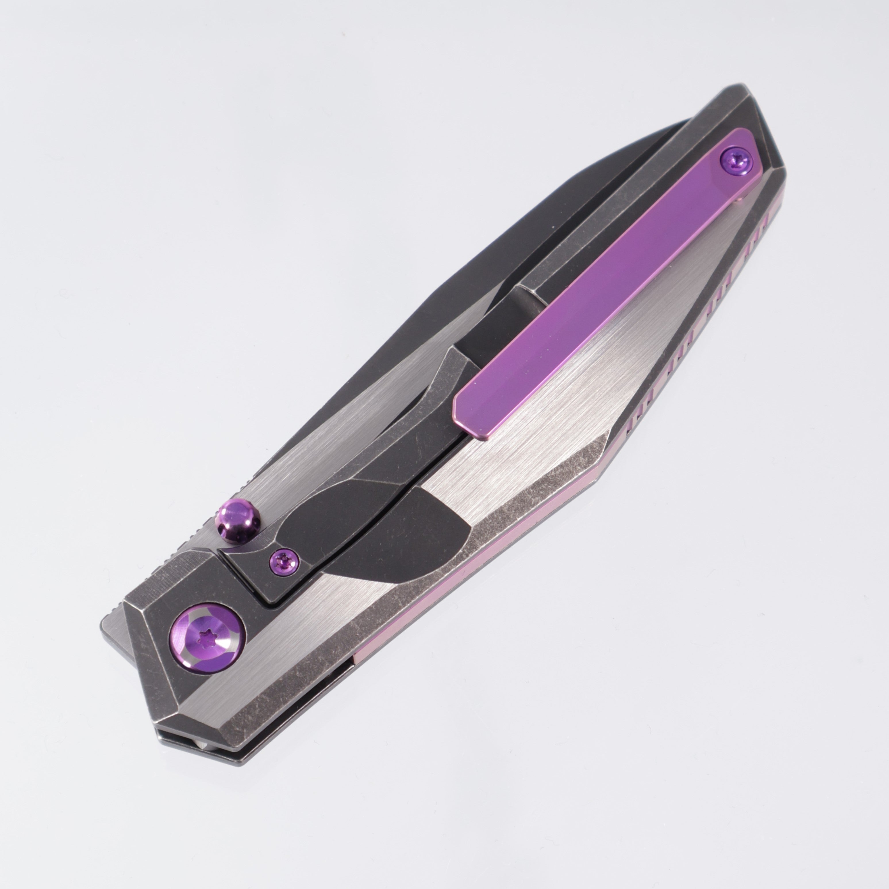 Poikilo Komodo - Dark Stonewash M398 - Ti with Purple Anodization - S