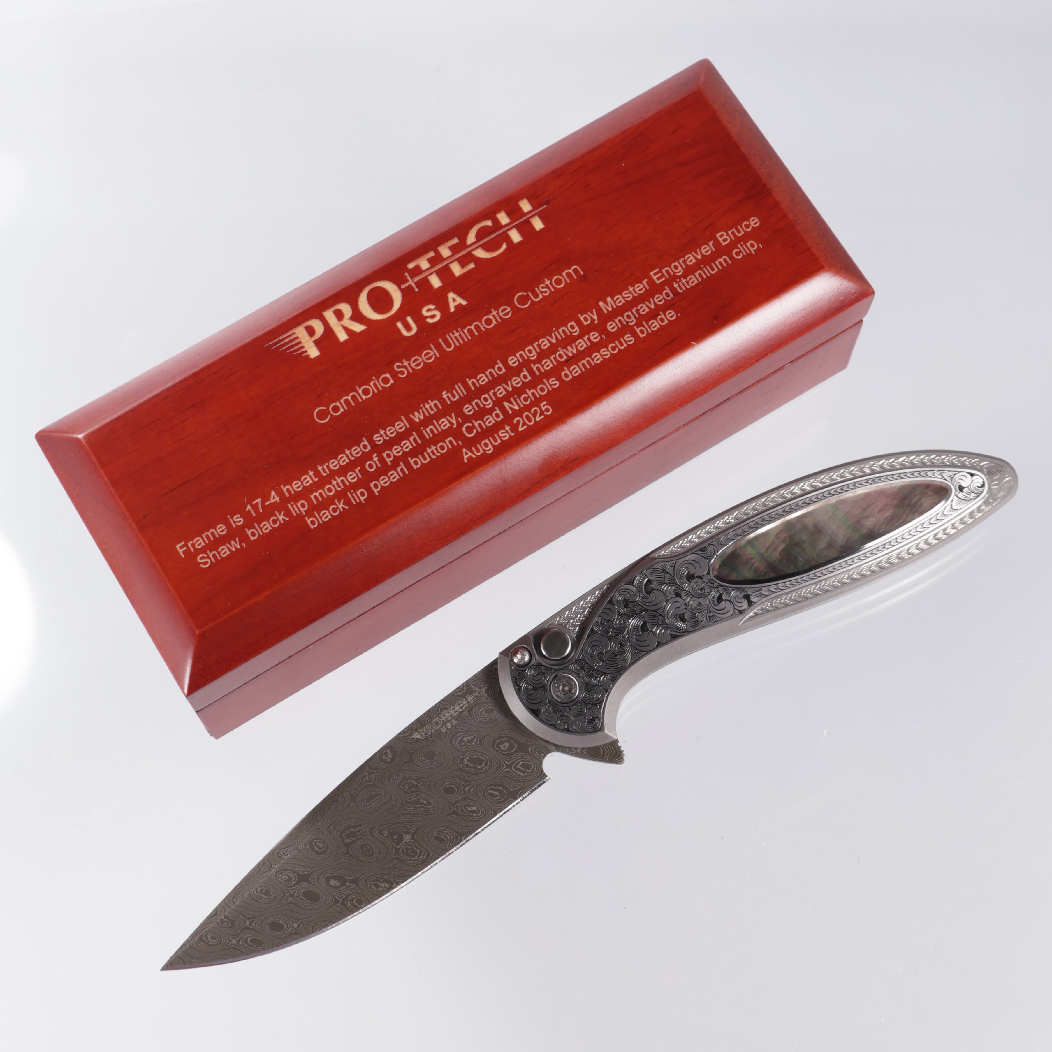 Protech Cambria 2 2025 Ultimate Custom 012 - Bruce Shaw fully engraved 17-4 steel handle w/ Black Lip Pearl inlay & button - Chad Nichols Damascus (Option #1)