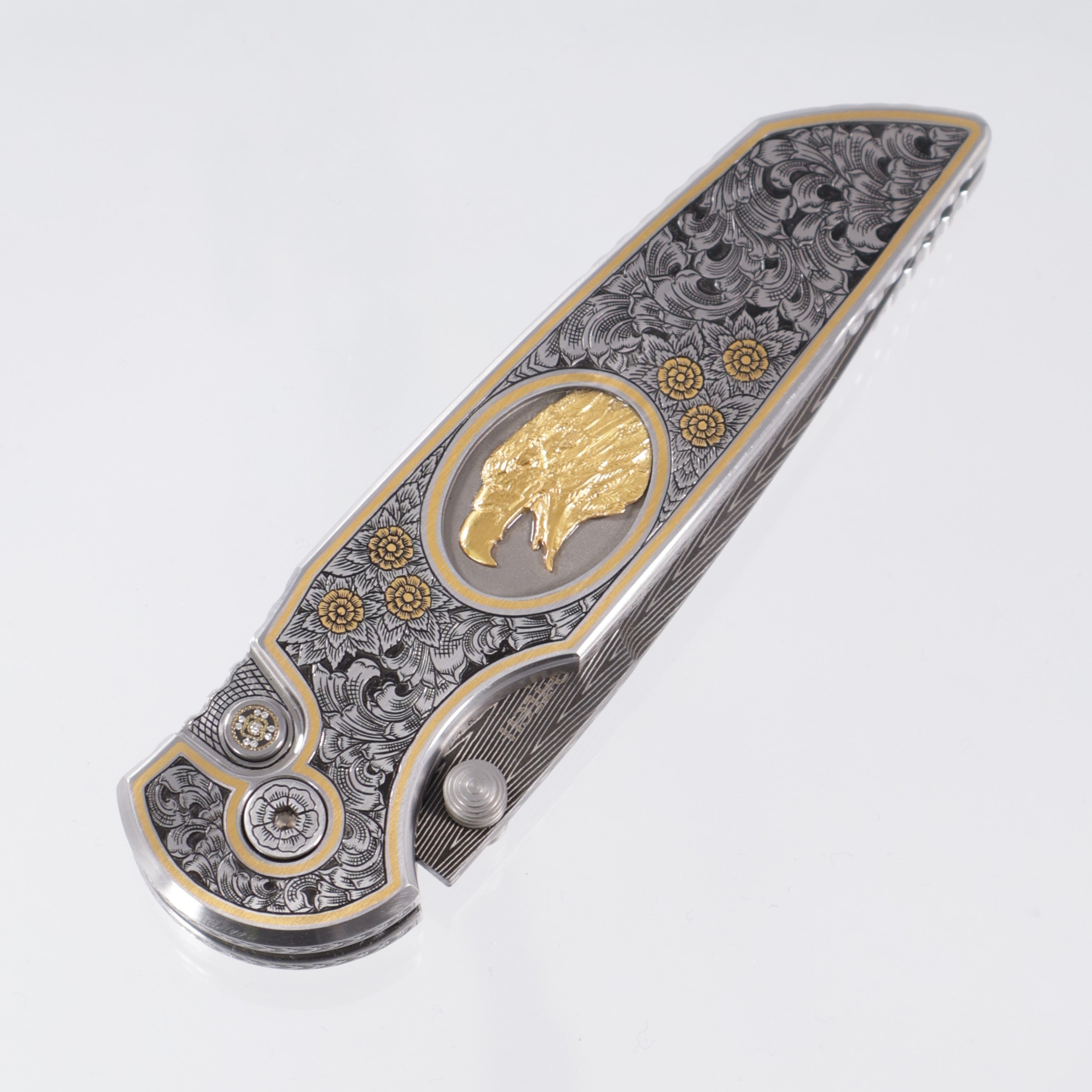 Pro-Tech TR-3 Integrity Gold & Steel Ultimate Custom #4 - Hand Engraved Deluxe Leafy Scroll Stainless chassis by Bruce Shaw w/ 24kt Gold Hand Sculpted Eagle inlay - Happy Jewelers Custom Mosaic Diamond button - Vegas Forge Carbon Herringbone Damascus