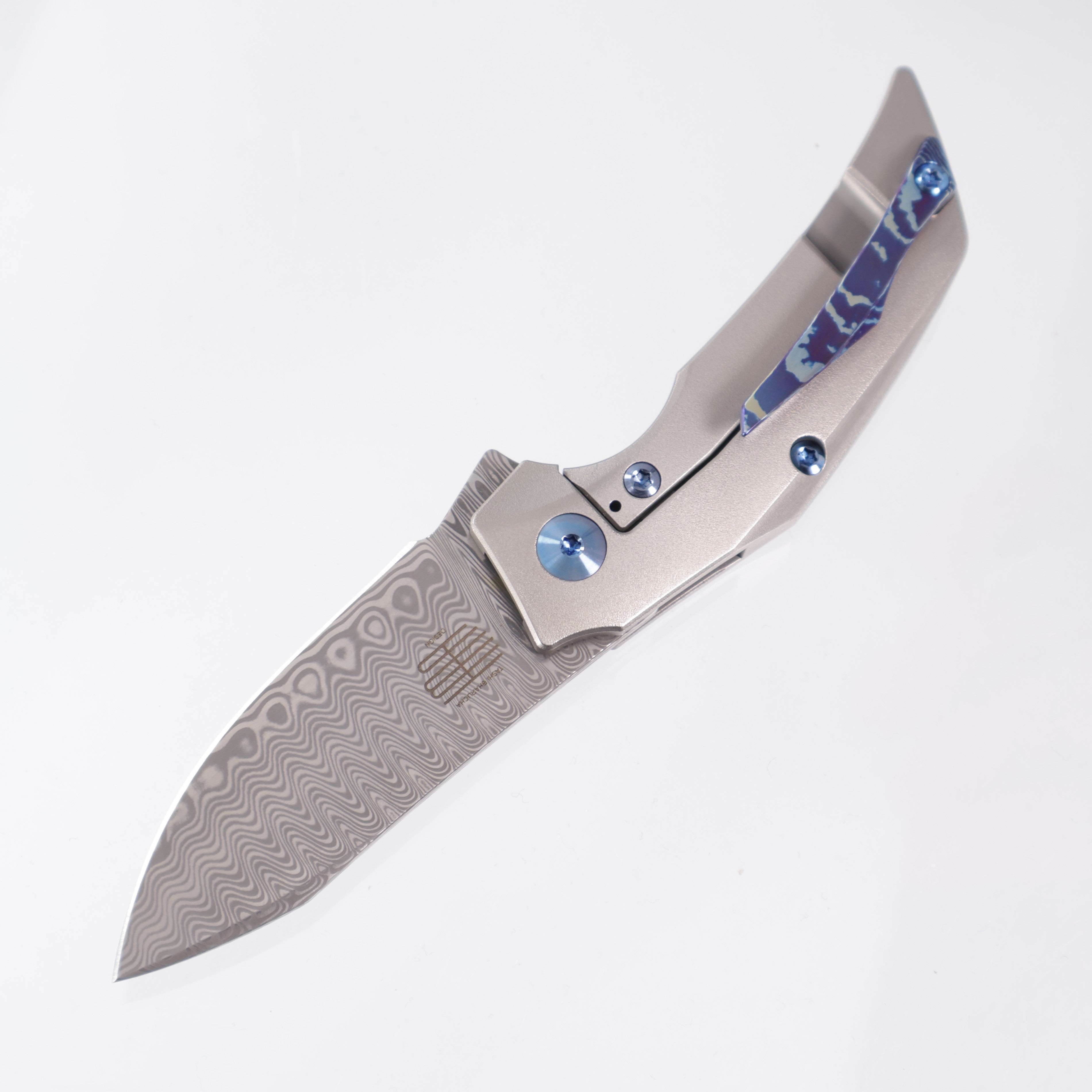 Reate T2500 - Titanium w/ MokuTi Inlay & Clip - Acidwash Damasteel