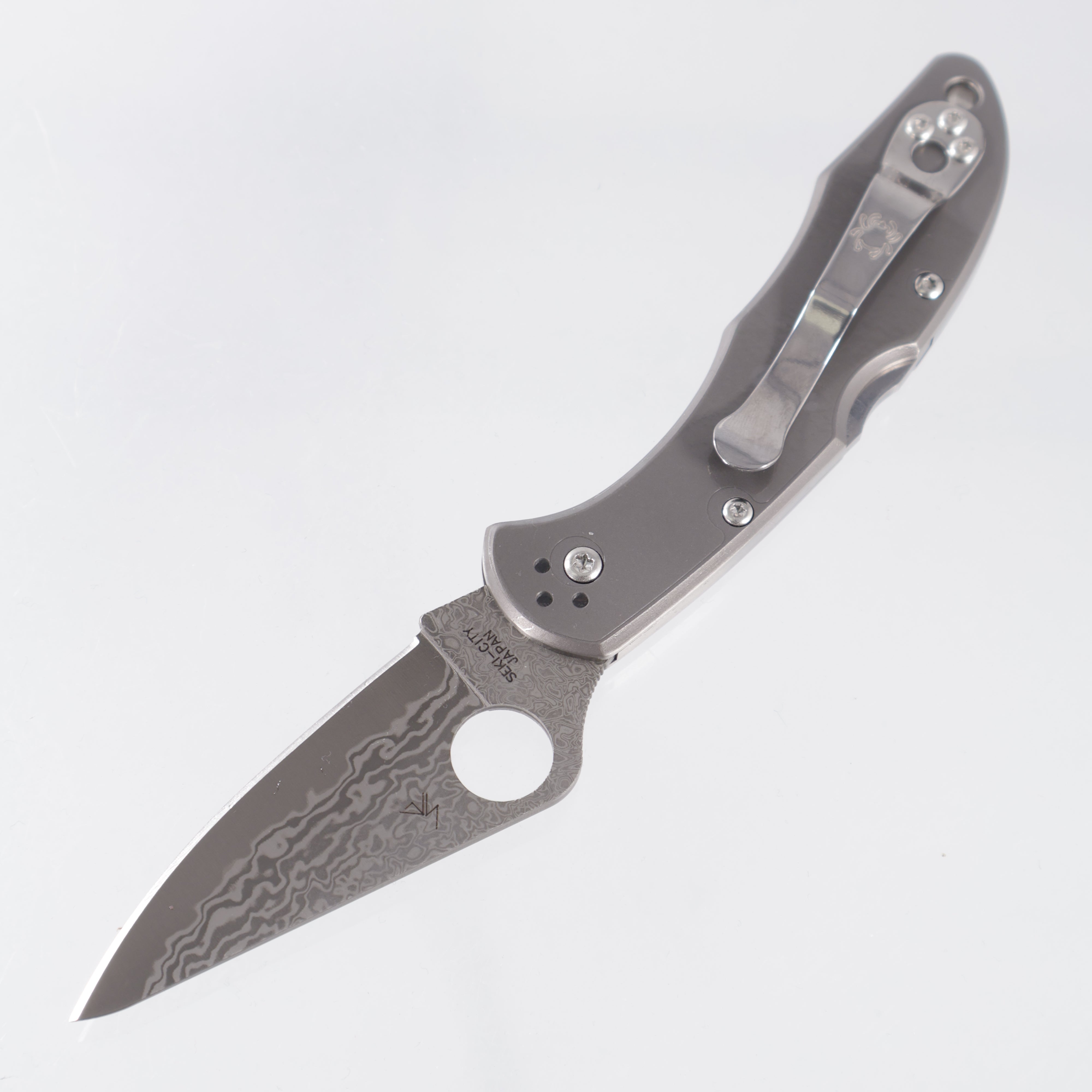 Spyderco Delica 4 - Titanium Scales - VG-10 Damascus - C11TIPD