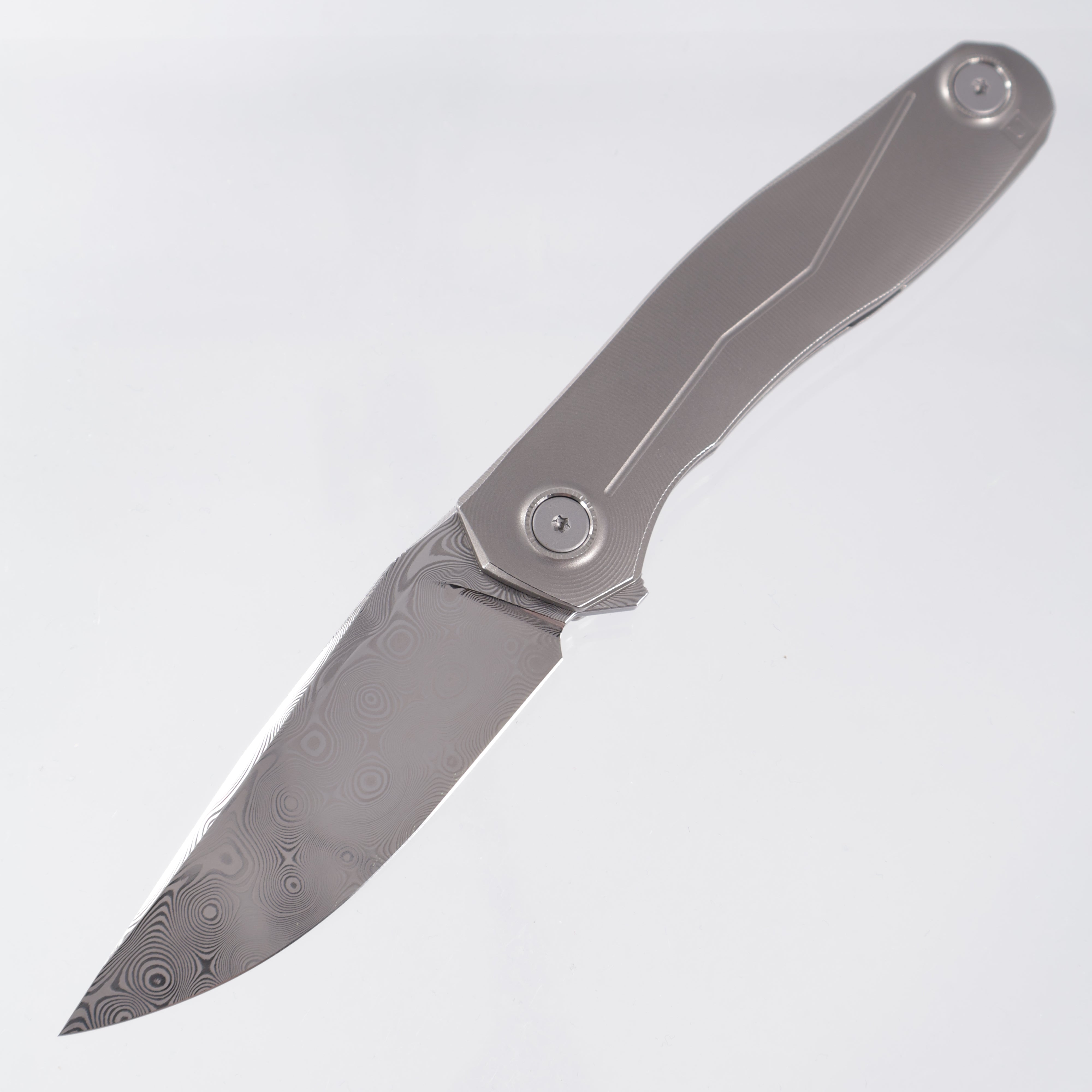 Uldanov Knives R2 - Radial Milled Titanium w/ Blue Ti Standoff - ZDP 1016 Damascus