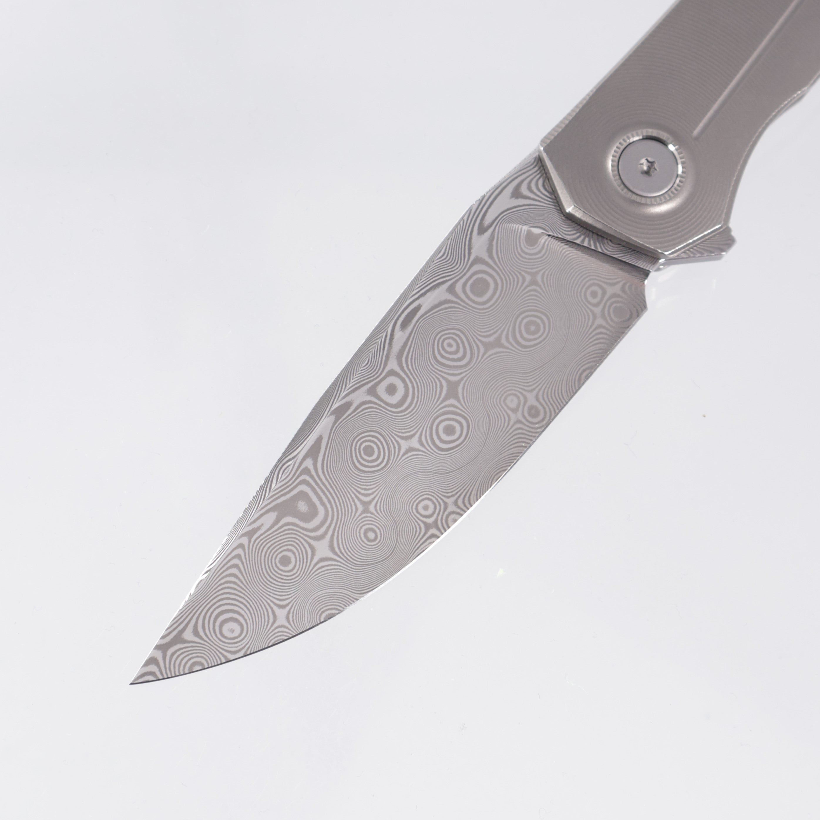 Uldanov Knives R2 - Radial Milled Titanium w/ Blue Ti Standoff - ZDP 1016 Damascus