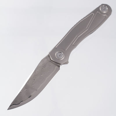Uldanov Knives R2 Semi-Integral - Radial Milled Titanium w/ Integrated Backstrap - Laminated Magnacut Core Damascus