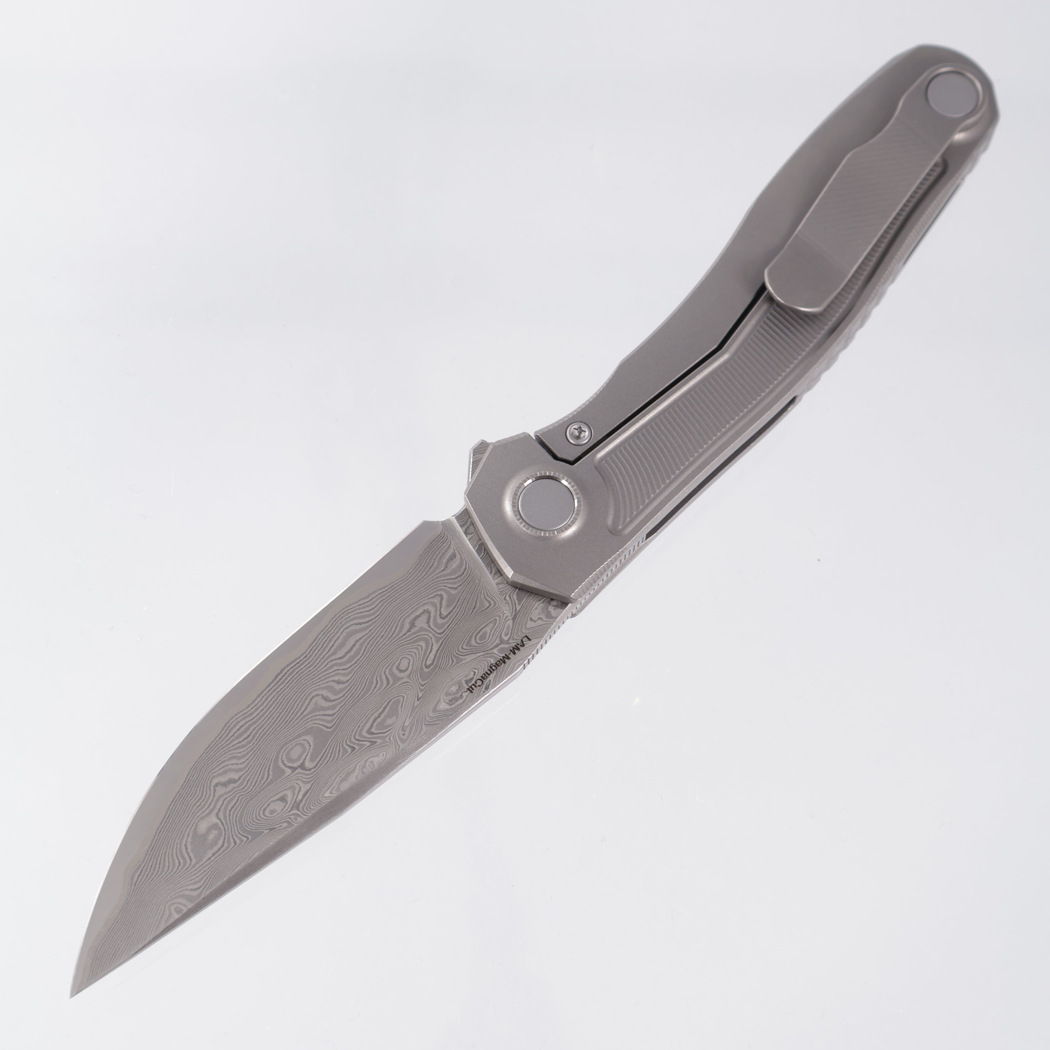 Uldanov Knives R2 Semi-Integral - Radial Milled Titanium w/ Integrated Backstrap - Laminated Magnacut Core Damascus