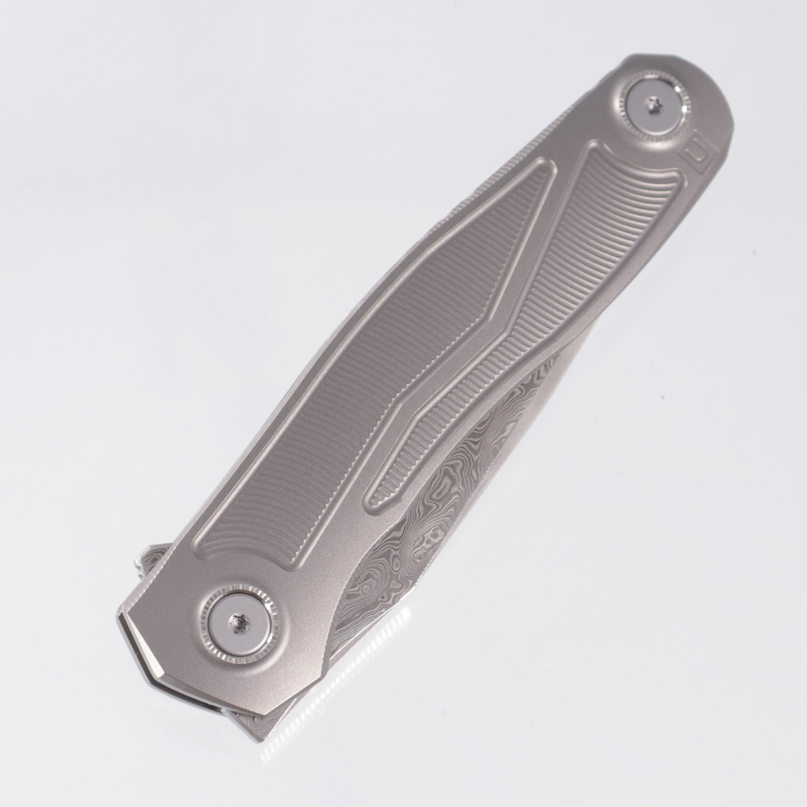 Uldanov Knives R2 Semi-Integral - Radial Milled Titanium w/ Integrated Backstrap - Laminated Magnacut Core Damascus